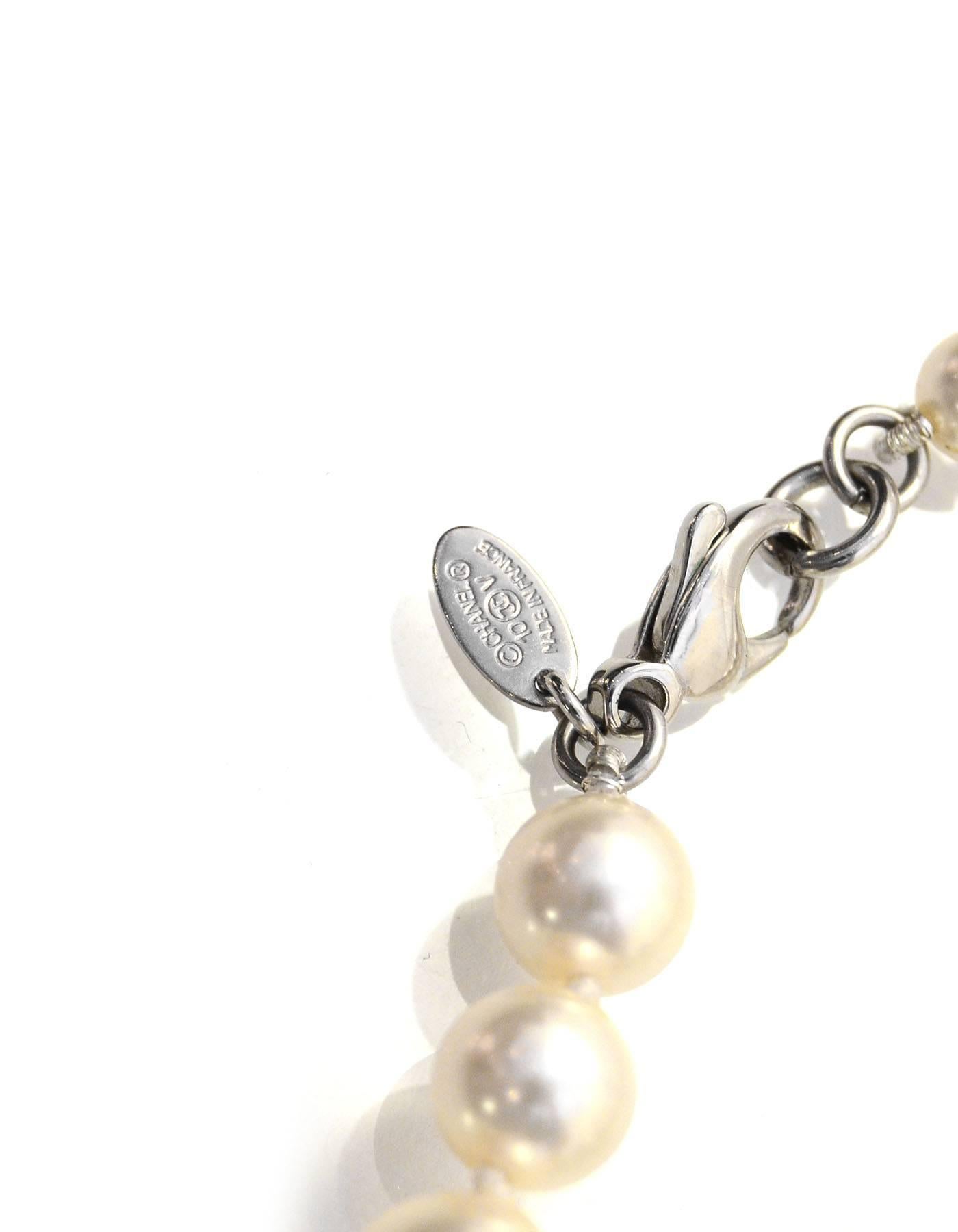 100% Authentic Chanel Graduated Pearl & Beaded CC Necklace

Made In: France
Year of Production: 2010
Color: Ivory and silvertone
Materials: Metal, faux pearl and beads
Closure: Lobster claw clasp
Stamp: 10 CC V
Overall Condition: Excellent pre-owned