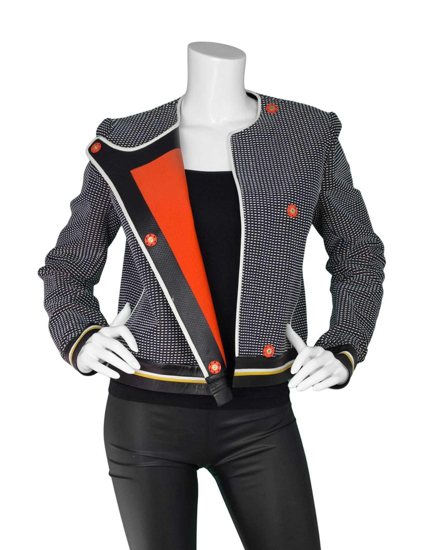 Fendi Navy Black & White Knit Jacket 
Features White leather piping, yellow, black and white striped leather trim and hemline of jacket and orange accents

Made In: Italy
Color: Black, white, navy, orange and yellow
Composition: 60% cotton, 32%
