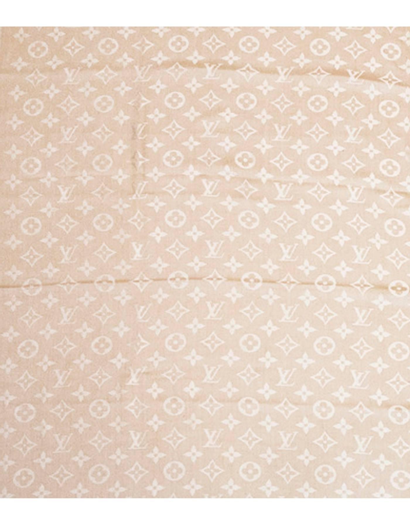 Louis Vuitton Nude Monogram Wool & Silk Large Shawl
Features fringe throughout edges

Made In: Italy
Color: Nude
Composition: 60% silk, 40% wool
Retail Price: $590 + tax
Overall Condition: Excellent pre-owned condition with the exception of a