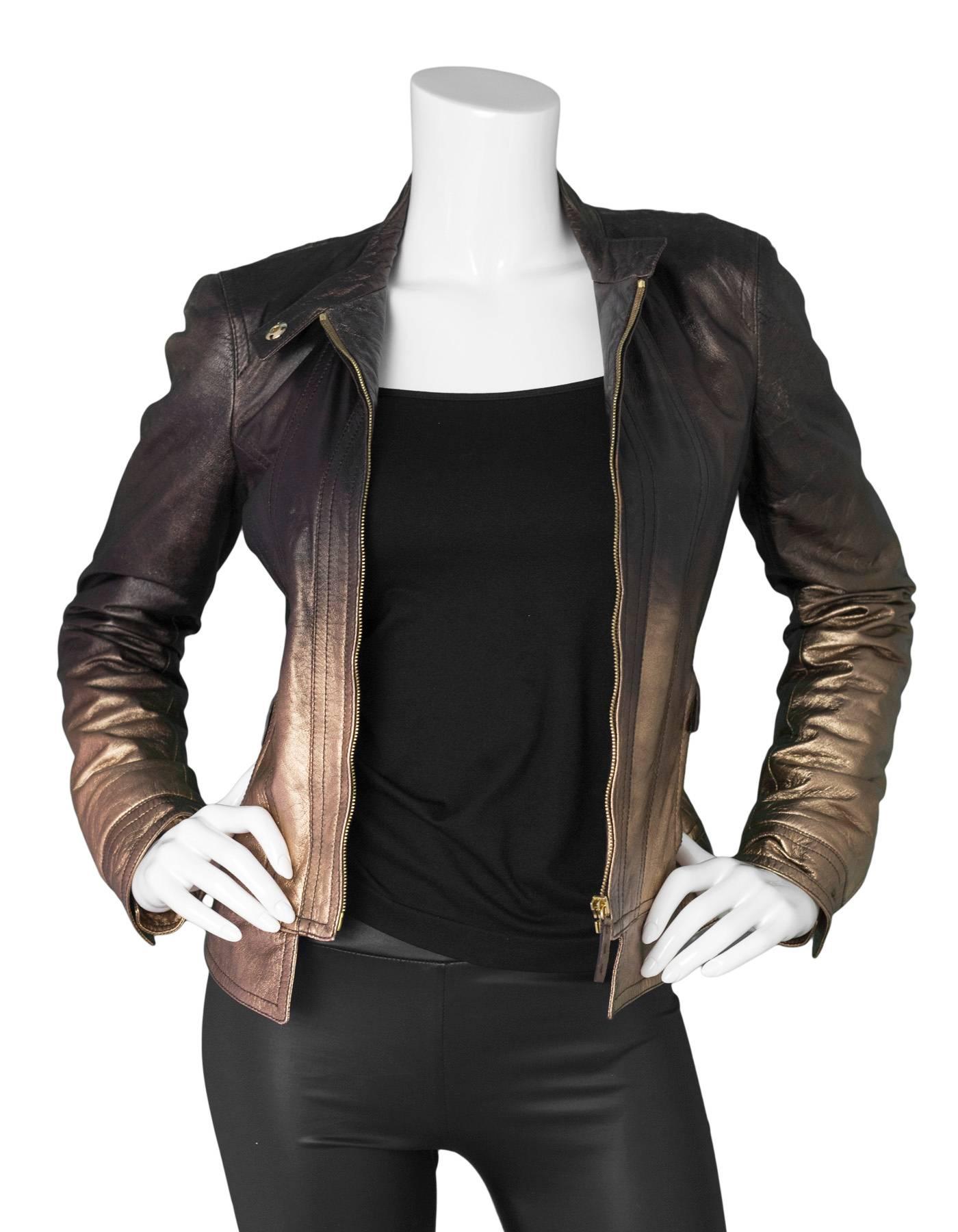 Roberto Cavalli Bronze Metallic Ombre Leather Jacket
Features braided leather drawstring detail at opening

Color: Bronze ombre
Composition: Not given- believed to be 100% leather
Lining: Bronze and black snakeskin print
Closure/Opening: Zip up