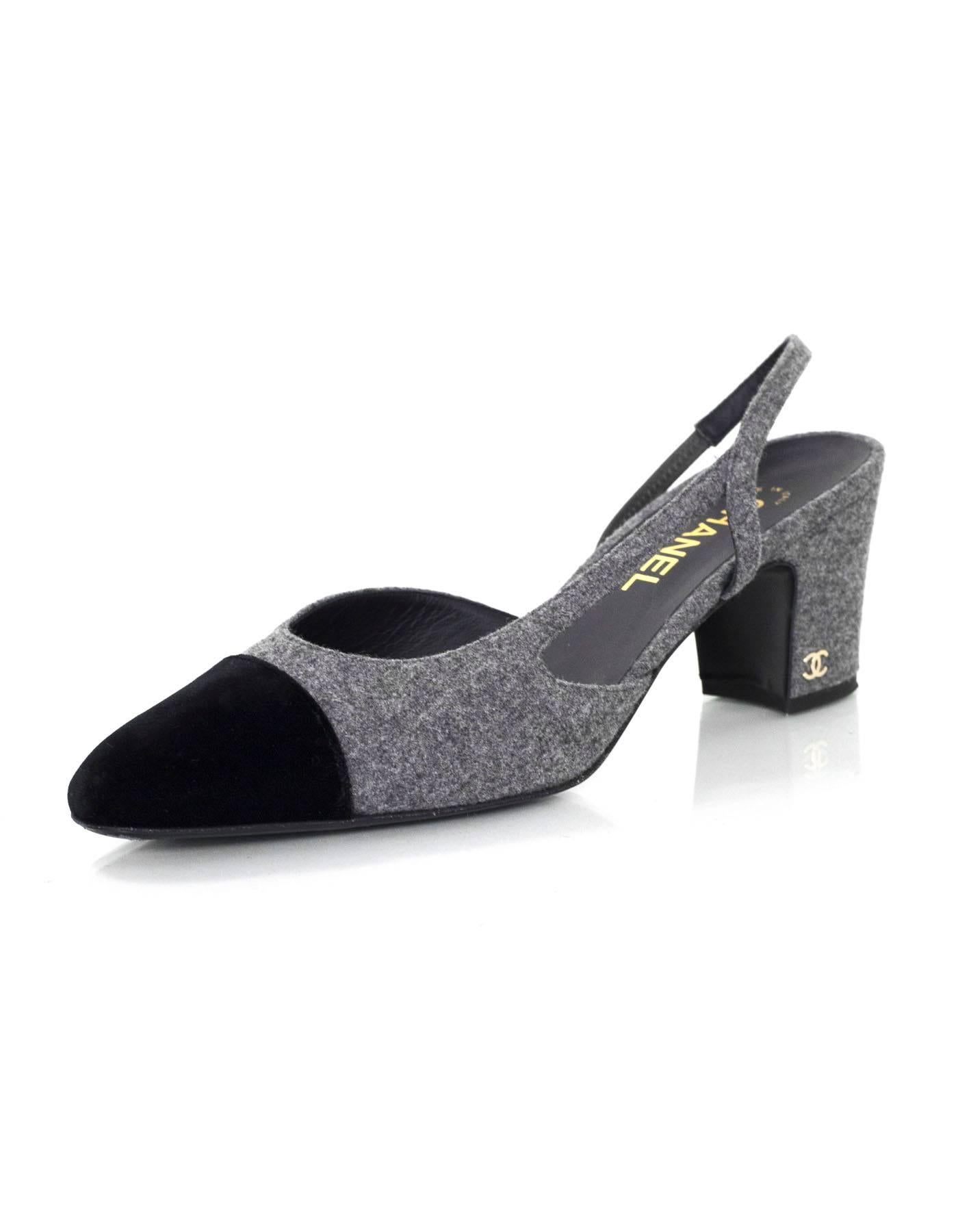 Chanel Black and Grey Slingback Pumps Sz 41
Features grey felt throughout and black velvet cap toes

Made In: Italy
Color: Black and grey
Closure/Opening: Slingback strap
Sole Stamp: CC Made in Italy 41
Overall Condition: Excellent pre-owned