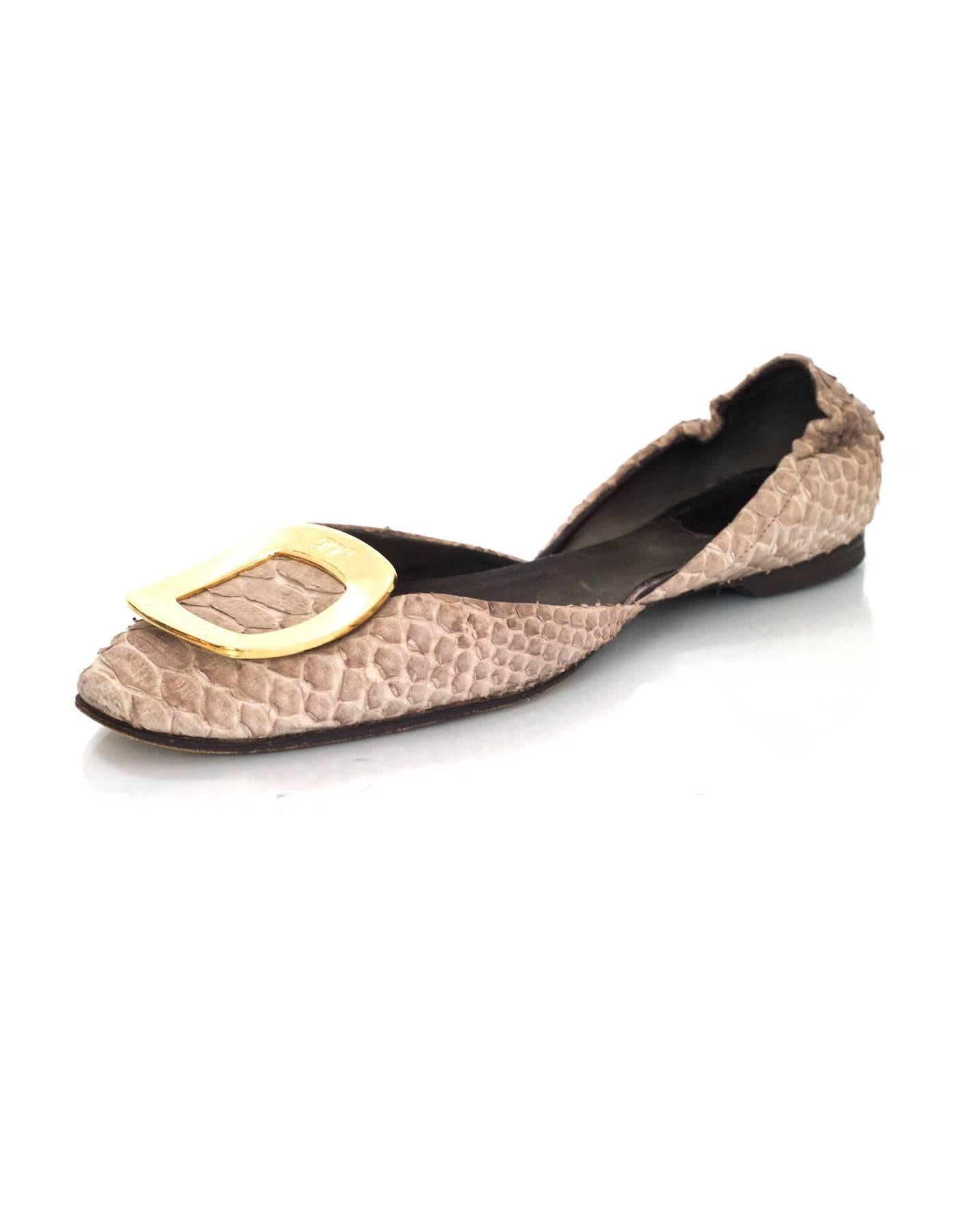 Roger Vivier Taupe Python Flats Sz 38

Made In: Italy
Color: Taupe, gold
Materials: Python, metal
Closure/Opening: Slide on
Sole Stamp: Made in Italy Women's size 38
Overall Condition: Very good pre-owned condition with the exception of wear at