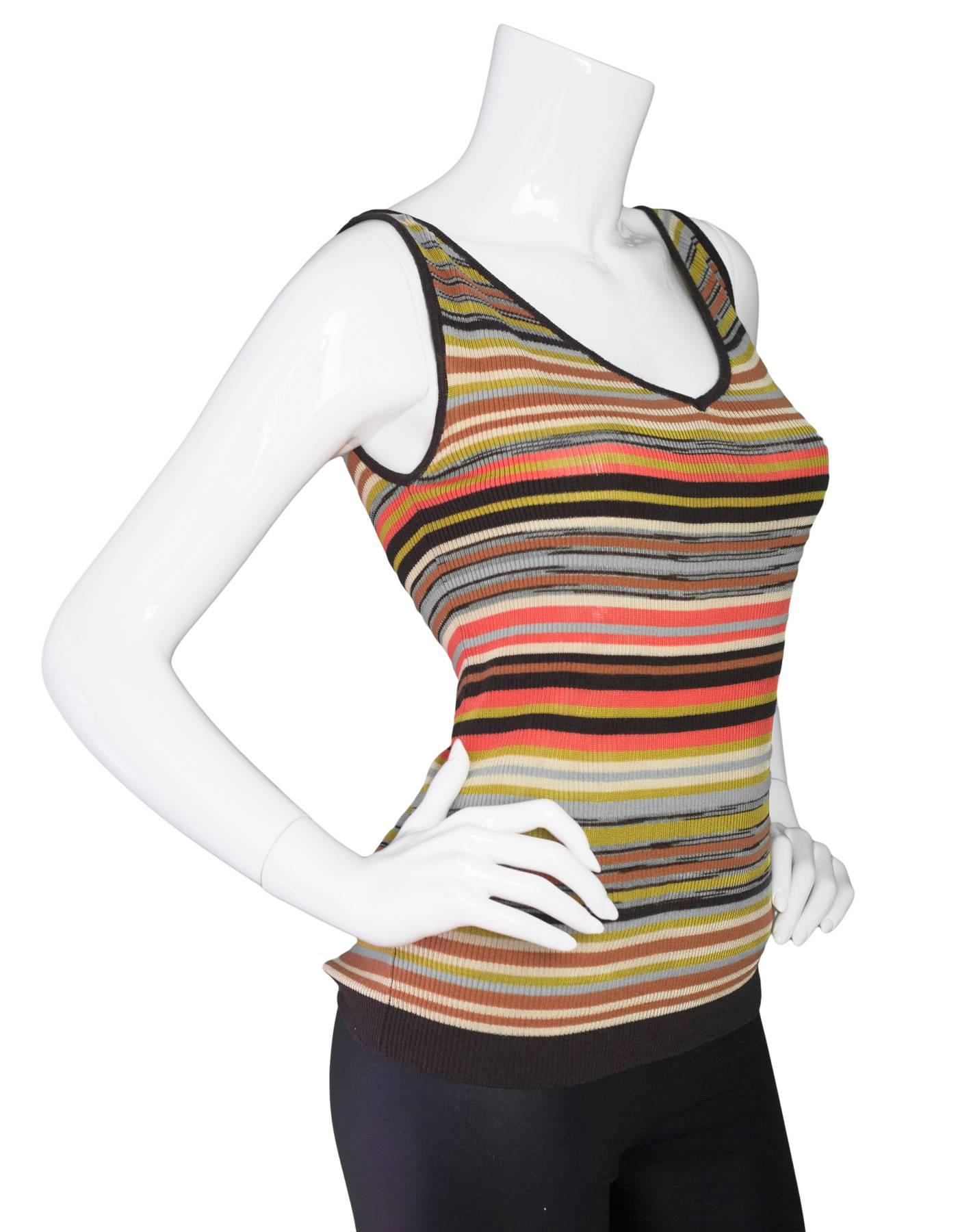 M Missoni Multi-Color V-Neck Top Sz 40

Made In: Italy
Color: Brown, orange, green
Lining: None
Closure/Opening: Pull over
Exterior Pockets: None
Interior Pockets: None
Overall Condition: Excellent pre-owned condition with the exception of some