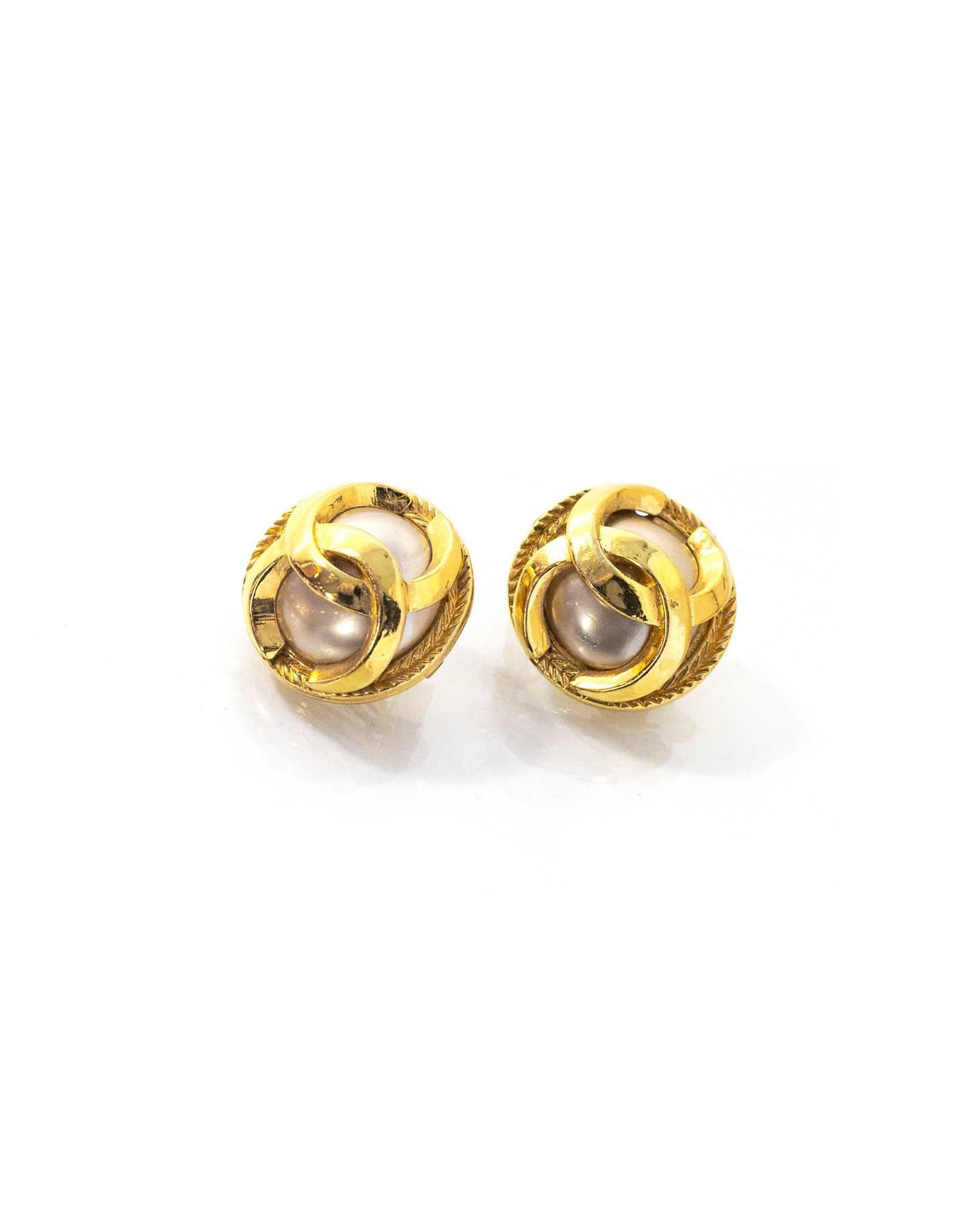 Chanel Goldtone & Pearl CC Clip On Earrings 

Made In: France
Color: Goldtone and ivory
Materials: Faux pearl and metal
Closure: Clip on
Stamp: Chanel CC Made in France 
Overall Condition: Excellent vintage, pre-owned condition with the