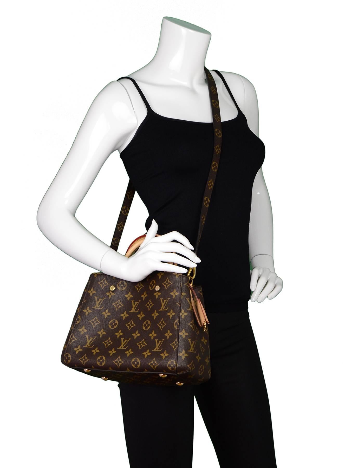 Louis Vuitton Monogram Montaigne BB Satchel Bag
Features optional monogram crossbody strap

Made In: France
Year of Production: 2015
Color: Brown
Hardware: Goldtone
Materials: Coated canvas, vachetta leather
Lining: Burgendy