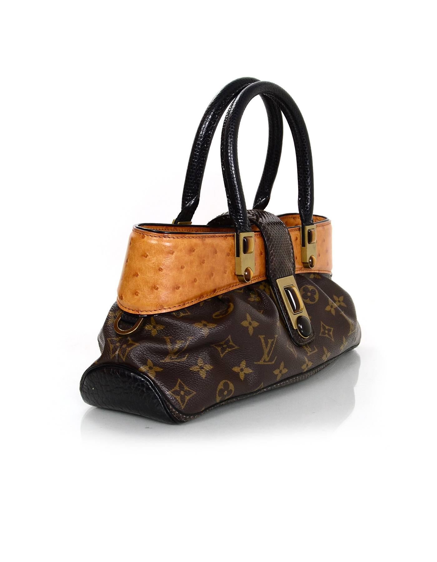 Louis Vuitton Ltd. Ed. Monogram & Ostrich Macha Waltz Bag 
Features lizard wrapped handles, python strap cllosure, ostrich trim at top of bag and leather bottom panel

Made In: France
Year of Production: 2005
Color: Brown and tan
Hardware:
