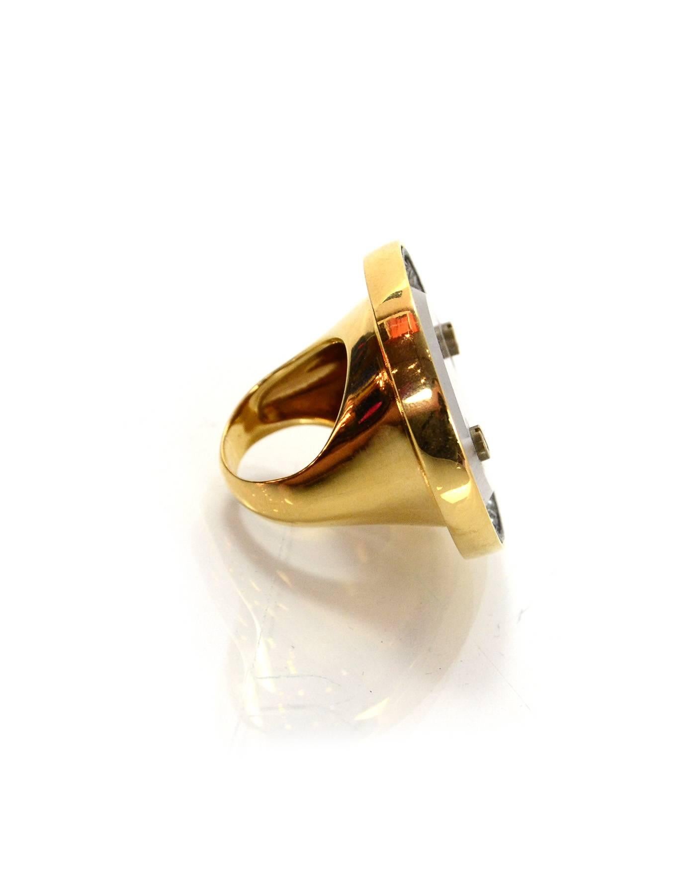 Lanvin Goldtone and Crystal Logo Ring Sz 6.5

Made In: France
Color: Gold
Materials: metal, crystal
Closure: None
Stamp: Lanvin Paris Made in France
Overall Condition: Excellent pre-owned condition with the exception of some surface scratching