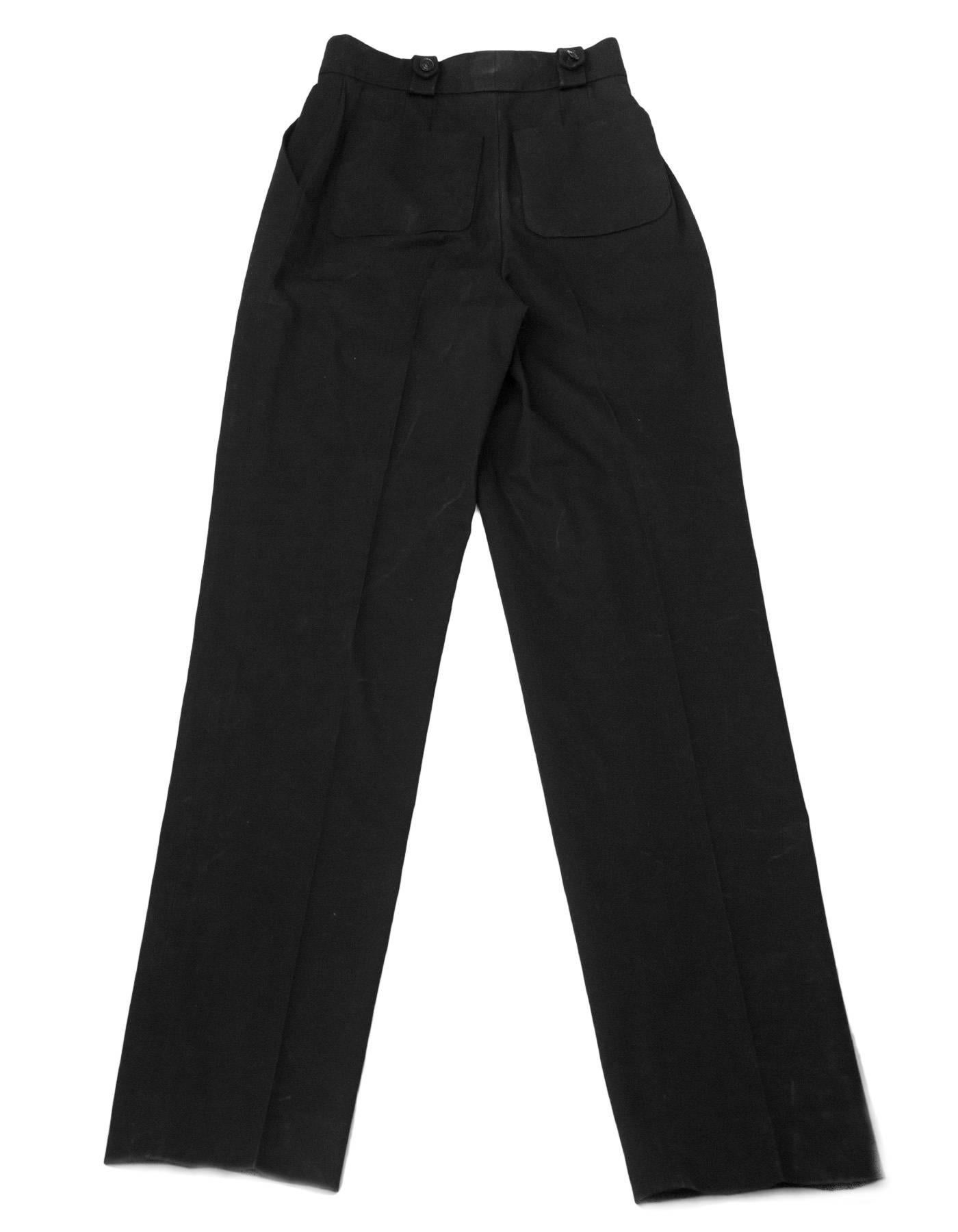 Chanel Black Cotton High Waisted Pants

Made in: France
Year of Production: 1999
Color: Black
Composition: 100% Cotton
Lining: None
Closure/opening: Zip up and button closure
Exterior Pockets: Two hip pockets and two back patch pockets
Interior