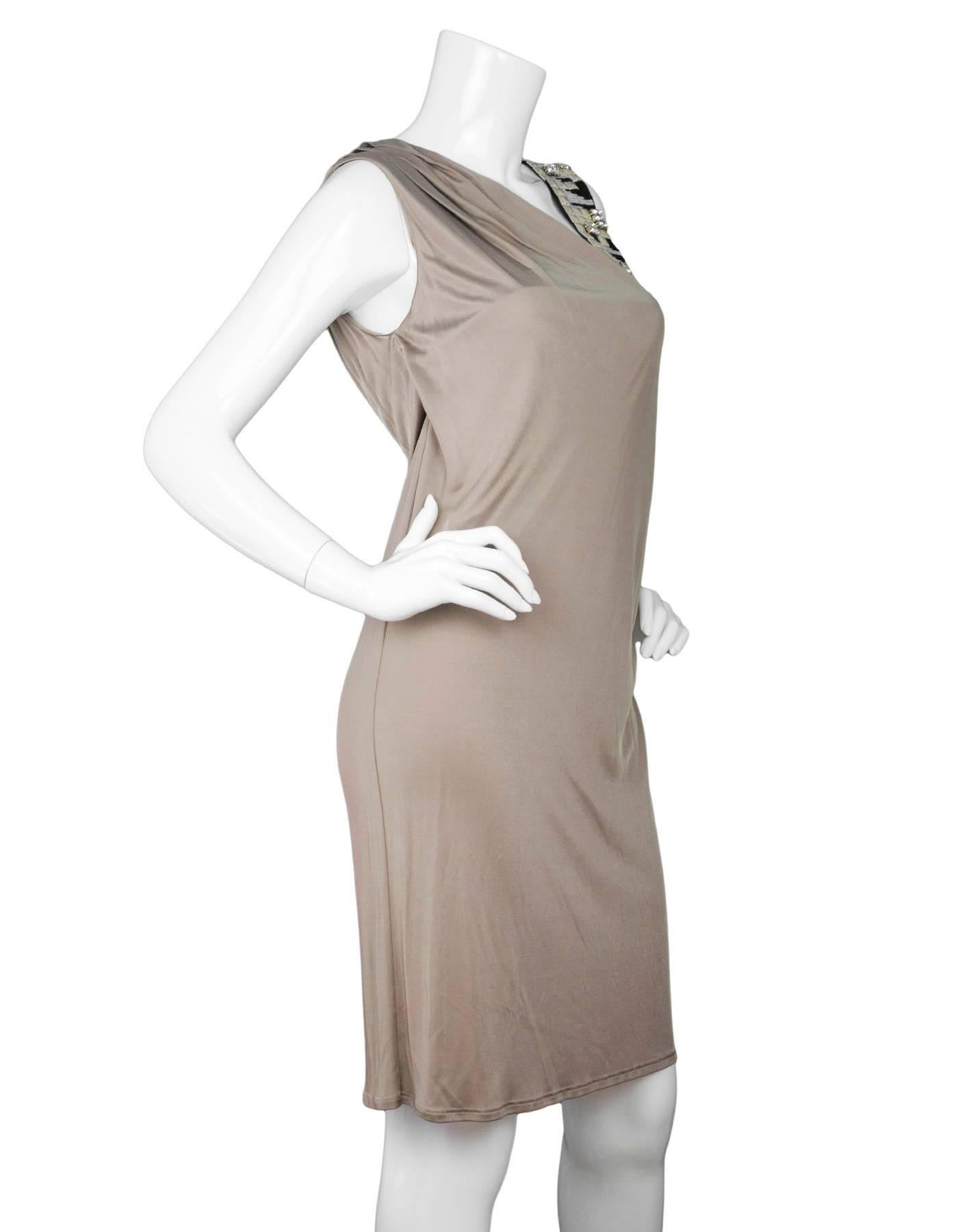 Emilio Pucci Taupe One-Shoulder Dress

Made In: Italy
Color: Taupe
Materials: Not listed
Lining: None
Closure/Opening: None
Overall Condition: Excellent pre-owned condition, one loose bead at shoulder strap

Marked Size: Not listed, believed to be