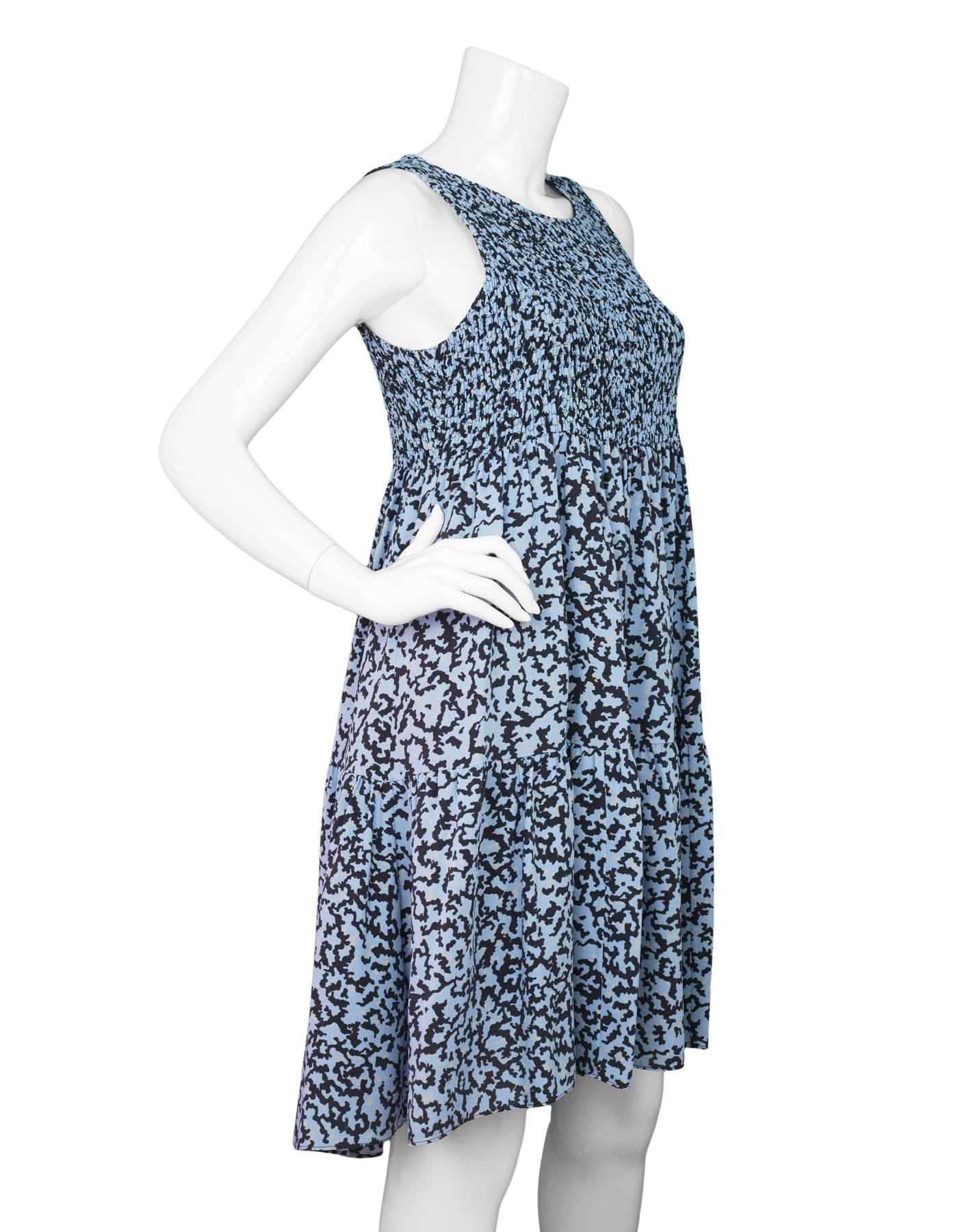 Proenza Schouler Blue Floral Print Silk Dress 
Features stretched ruched bustline

Made In: China
Color: Light blue, navy and yellow
Composition: 100% silk
Lining: Navy, 95% silk, 5% spandex
Closure/Opening: Pull over with one back neck button