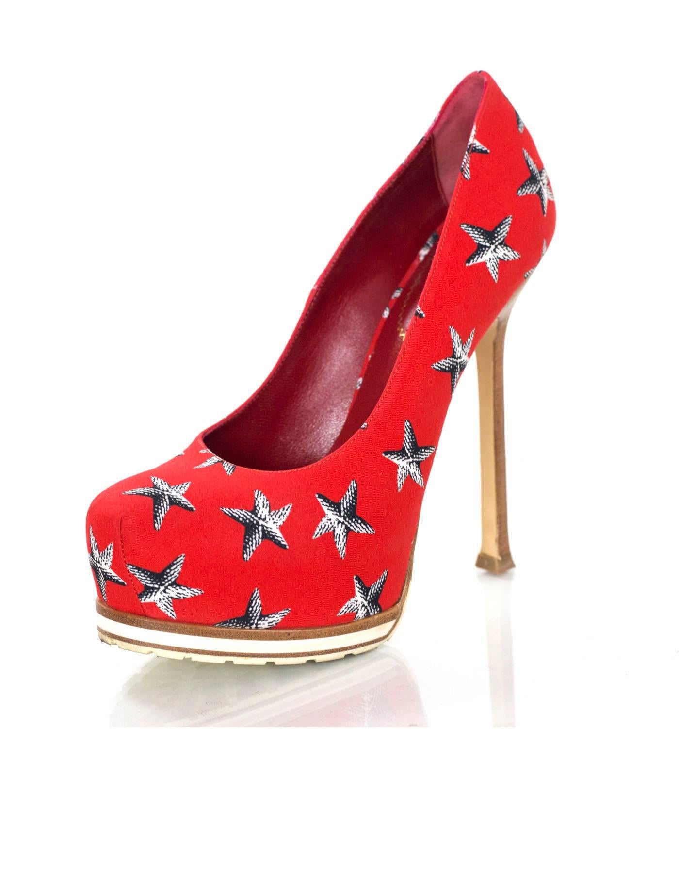 YSL Red Medium Starfish Tribtoo 105 Pumps Sz 36.5

Made In: Italy
Color: Red, white, blue
Materials: Canvas
Closure/Opening: Slip on
Sole Stamp: Yves Saint Laurent Made in Italy 36.5
Retail Price: $895 + tax
Overall Condition: Excellent pre-owned