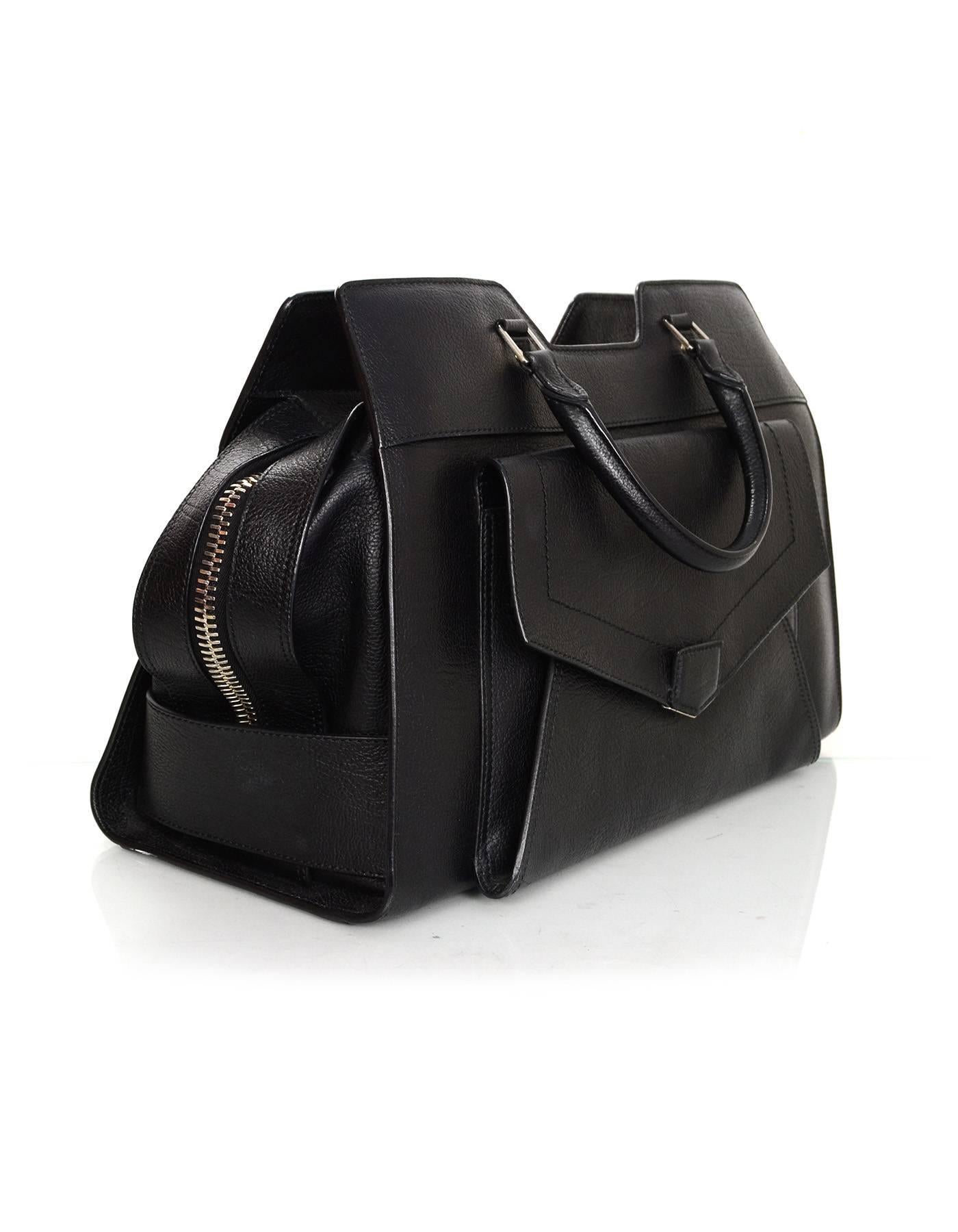 Proenza Schouler Black Leather Small PS13 Satchel 
Features optional shoulder/crossbody strap

Made In: Italy
Color: Black
Hardware: Silvertone
Materials: Leather
Lining: Beige linen
Closure/Opening: Double zip across top
Exterior Pockets: One front