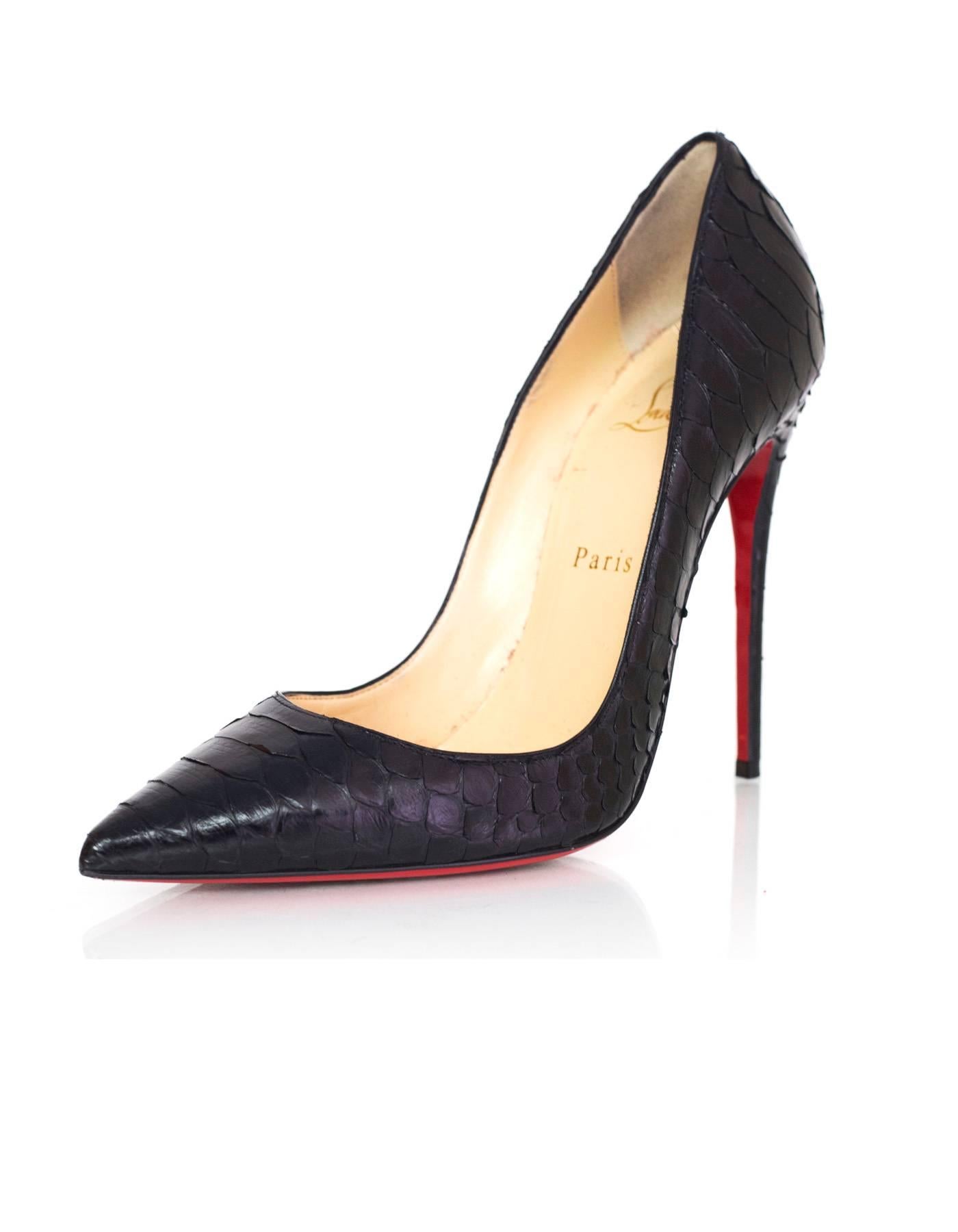 Christian Louboutin Black Python So Kate Pumps Sz 37.5

Made In: Italy
Color: Black
Materials: Python
Closure/Opening: Slide on
Sole Stamp: Christian Louboutin Made in Italy 37.5
Overall Condition: Excellent pre-owned condition with the exception of