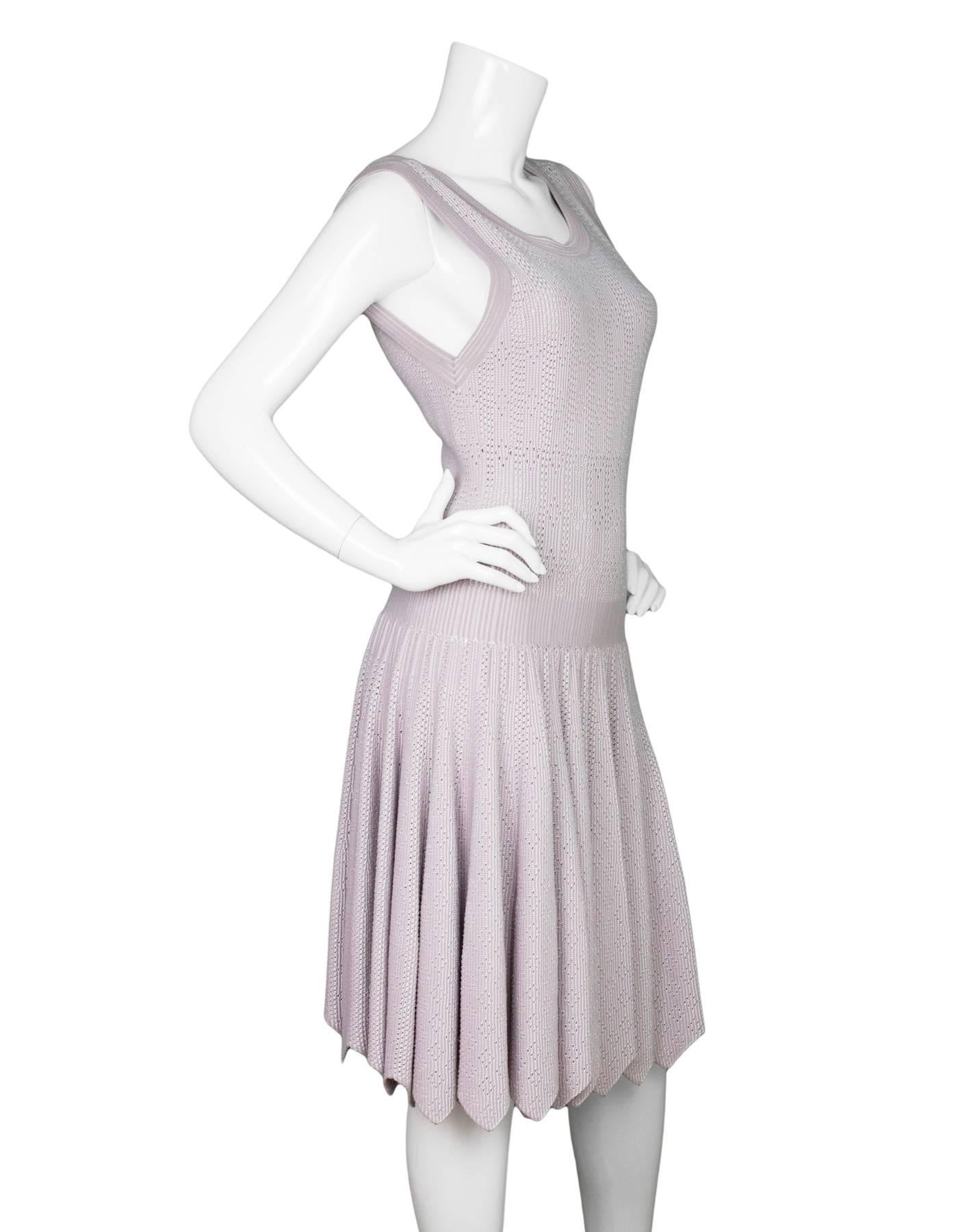 Alaia Mauve Eyelet Fit and Flare Dress Sz FR42
Features eyelet throughout

Made In: Italy
Color: Mauve / lavender
Composition: 85% viscose, 10% polyester, 5% nylon
Lining: None
Closure/Opening: Back zip closure
Overall Condition: Excellent pre-owned