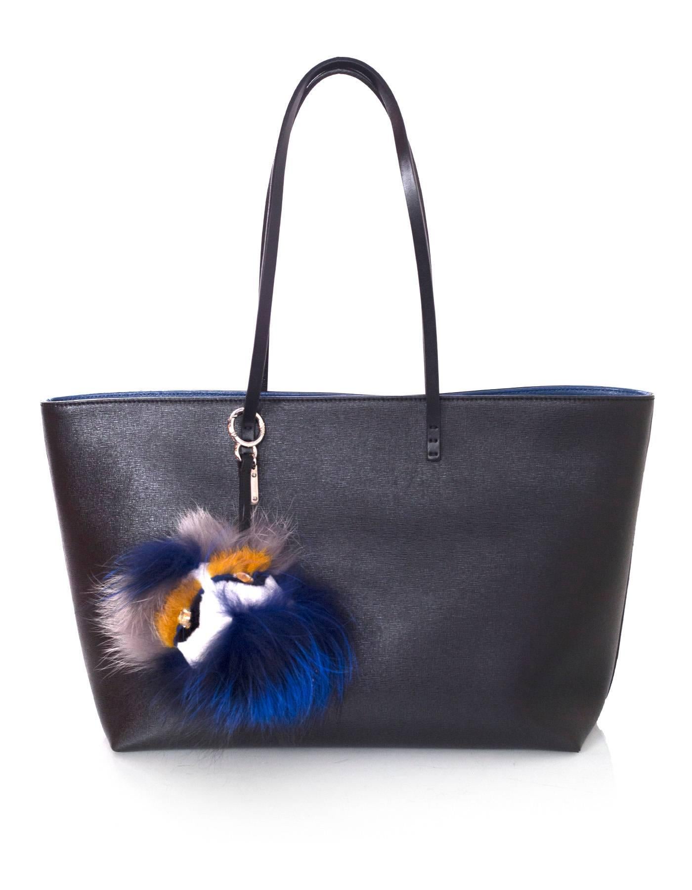 Fendi Blue and White Mink & Fox Fur Bag Bug Charm
Features Swarovski crystal eyes

Made In: Italy
Color: Blue, white
Hardware: Silvertone
Materials: Fox, mink
Closure/Opening: Jump ring push lever
Overall Condition: Excellent
Includes: Fendi box
