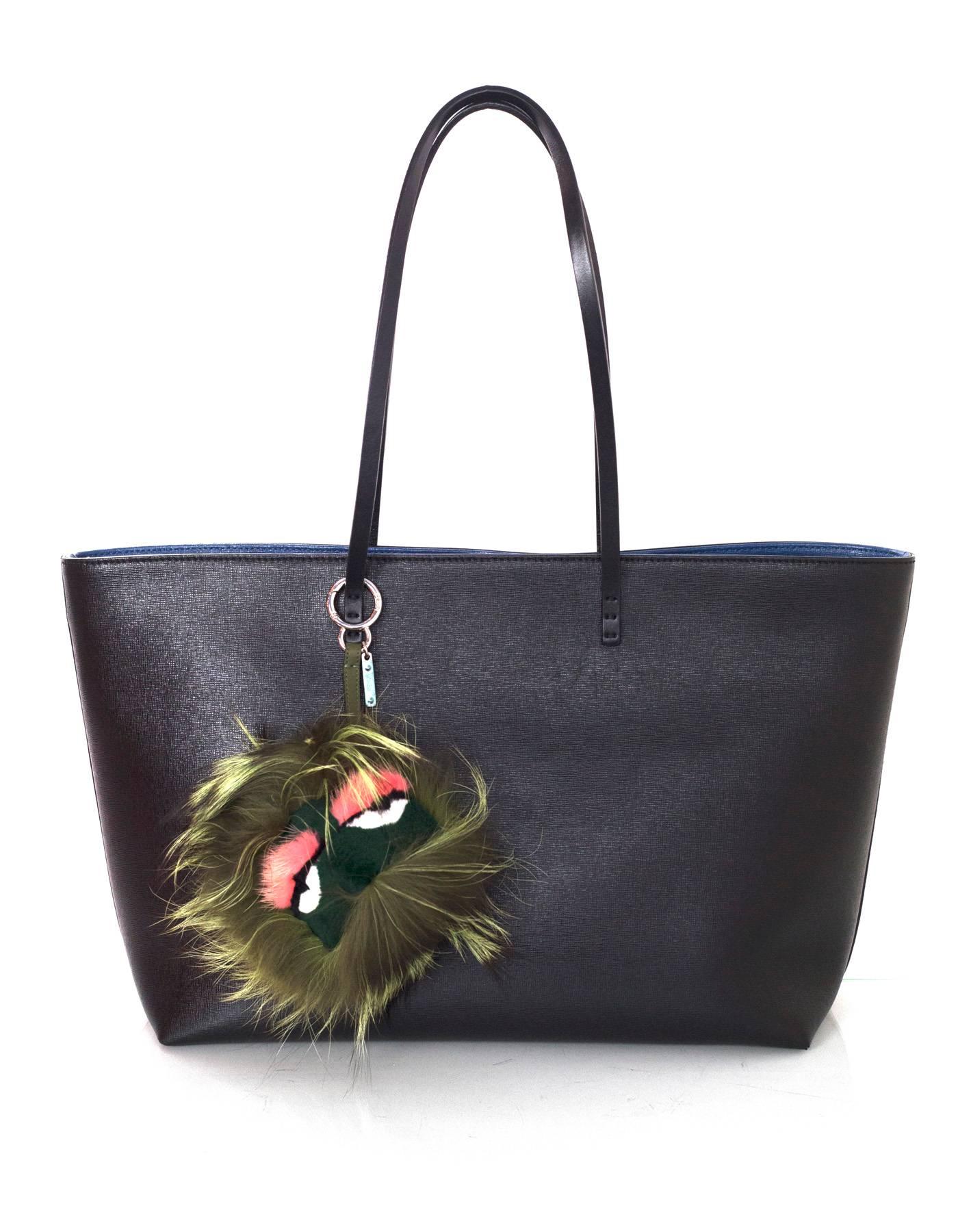 Fendi Green Mink & Fox Fur Bag Bug Charm 

Made In: Italy
Color: Green
Hardware: Silvertone
Materials: Fox, mink
Closure/Opening: Jump ring push lever
Retail Price: $850 + tax
Overall Condition: Excellent
Includes: Fendi box and dust