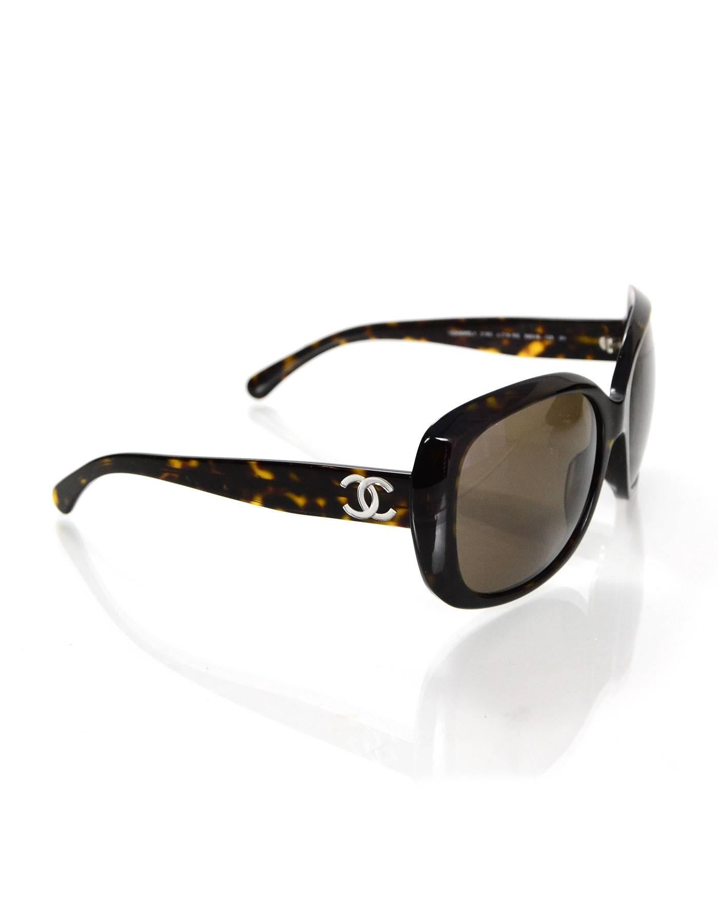 Chanel Tortoise Sunglasses
Features CC logo at arms

Made In: Italy
Color: Brown/tortoise
Materials: Resin
Overall Condition: Very good pre-owned condition - gentle wear throughout
Includes: Chanel case

Measurements: 
Length Across: 6"
Lens: