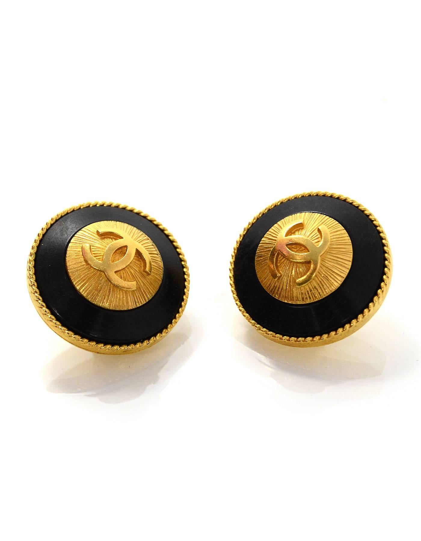 Chanel Black and Goldtone Clip-On Earrings

Made In: France
Year of Production: 1993
Color: Goldtone and black
Materials: Metal
Closure: Clip on
Stamp: Chanel 93 CC A Made in France
Overall Condition: Excellent vintage, pre-owned condition with