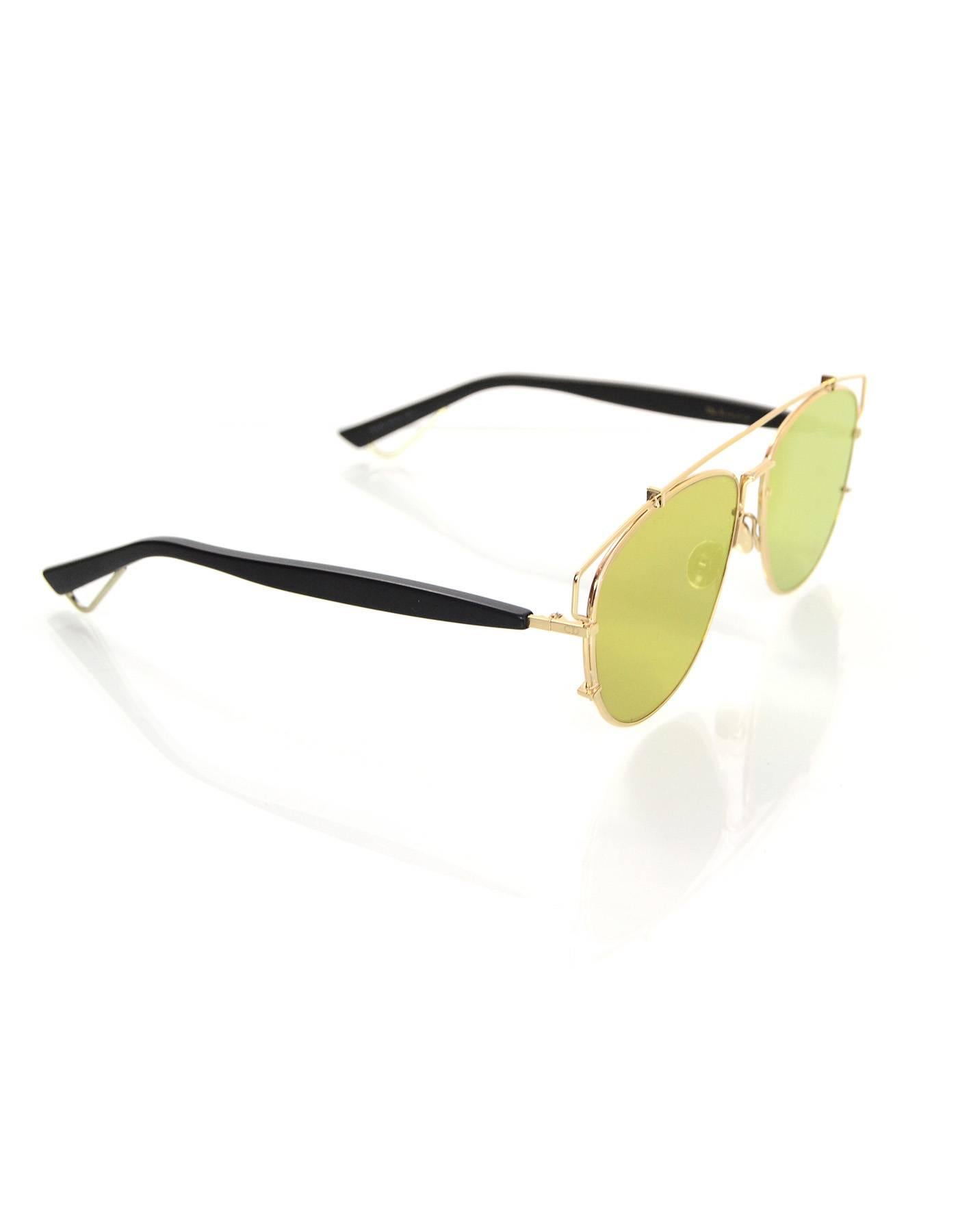 Christian Dior Gold Technologic Mirrored Sunglasses

Made In: Italy
Color: Gold
Materials: Metal, resin
Retail Price: $585 + tax
Overall Condition: Excellent pre-owned condition - minor faint surface marks
Includes: Christian Dior