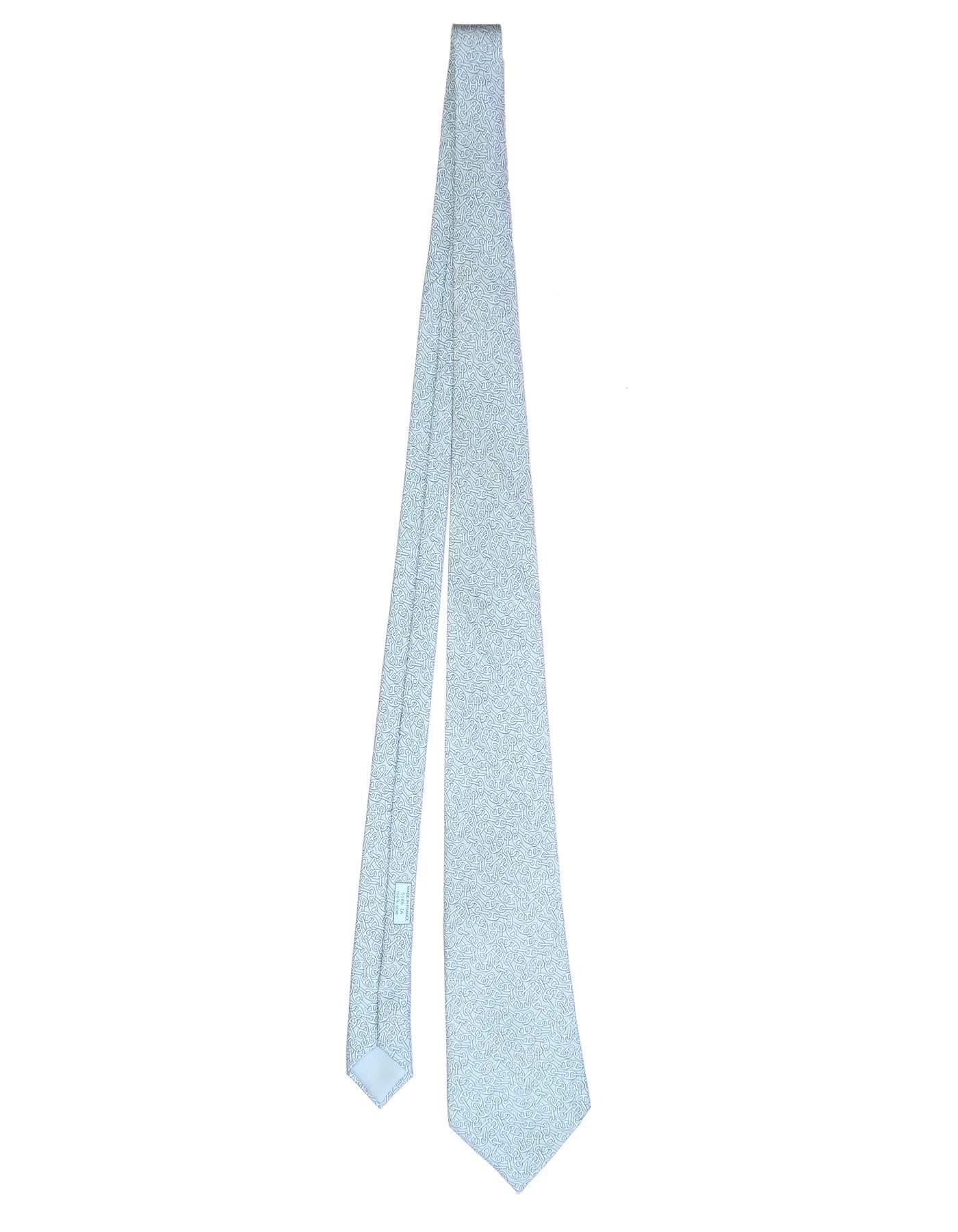 Hermes Light Blue Chaine d'Ancre Print Silk Tie

Made In: France
Color: Light blue and grey
Composition: 100% silk
Retail Price: $180 + tax
Overall Condition: Excellent pre-owned condition
Measurements: 
Length: 61"
Width: 1.75"-3.75"