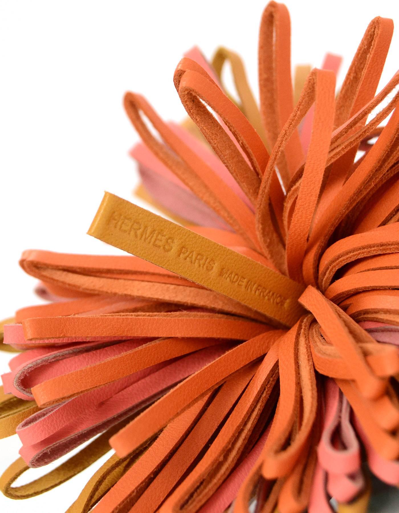 Hermes Tri-Color Carmen Tassel Key Ring 

Made In: France
Color: Mustard, pink, orange
Materials: Lambskin leather
Stamp: Hermes Paris Made in France
Overall Condition: Excellent pre-owned condition - 
Includes: Hermes box
Measurements: 
Total