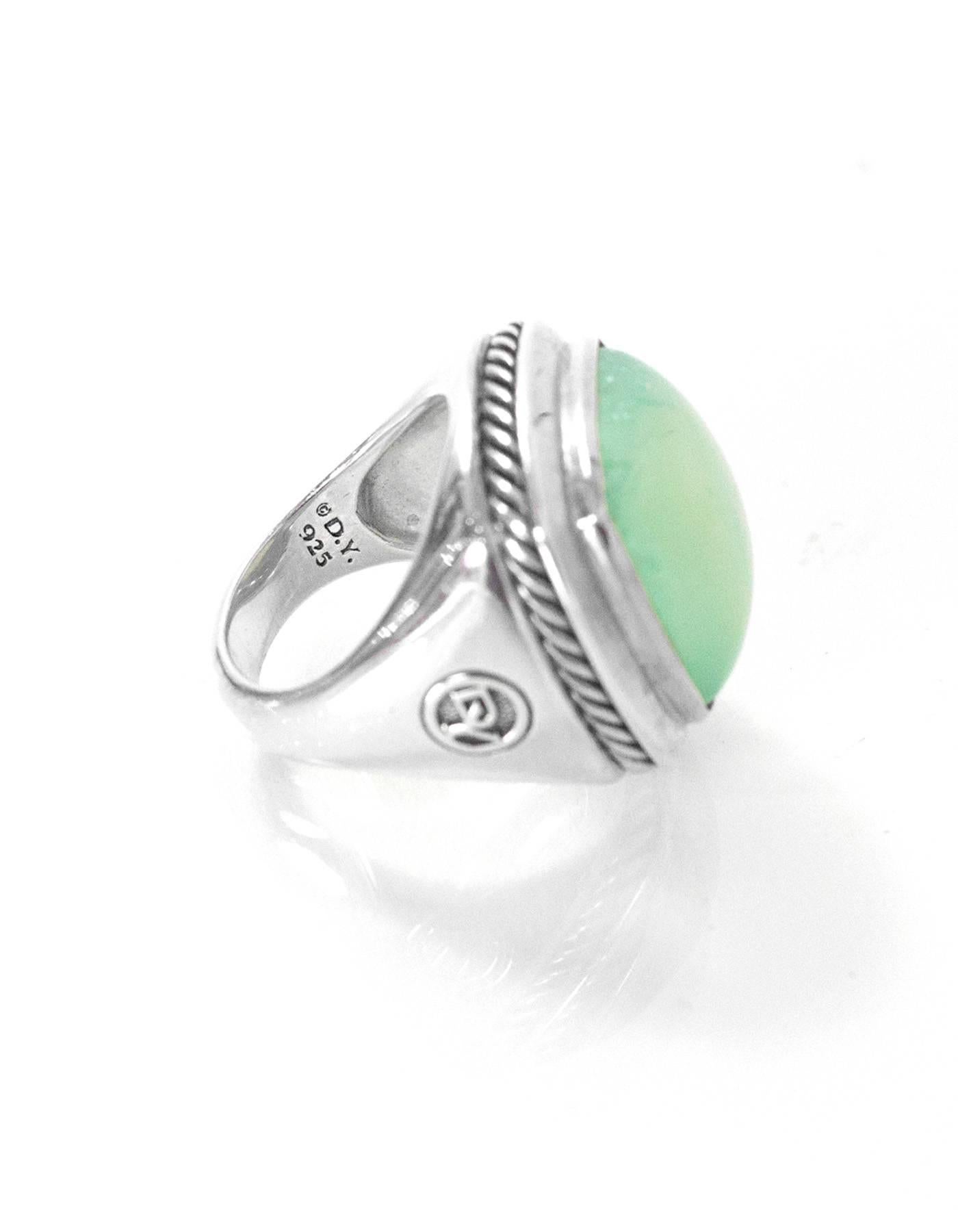 David Yurman Aqua Chalcedony & Sterling Albion Ring

Color: Teal and silver
Materials: Sterling and precious stone
Closure: None
Stamp: D.Y. 925
Retail Price: $850 + tax
Overall Condition: Excellent pre-owned condition with the exception of some