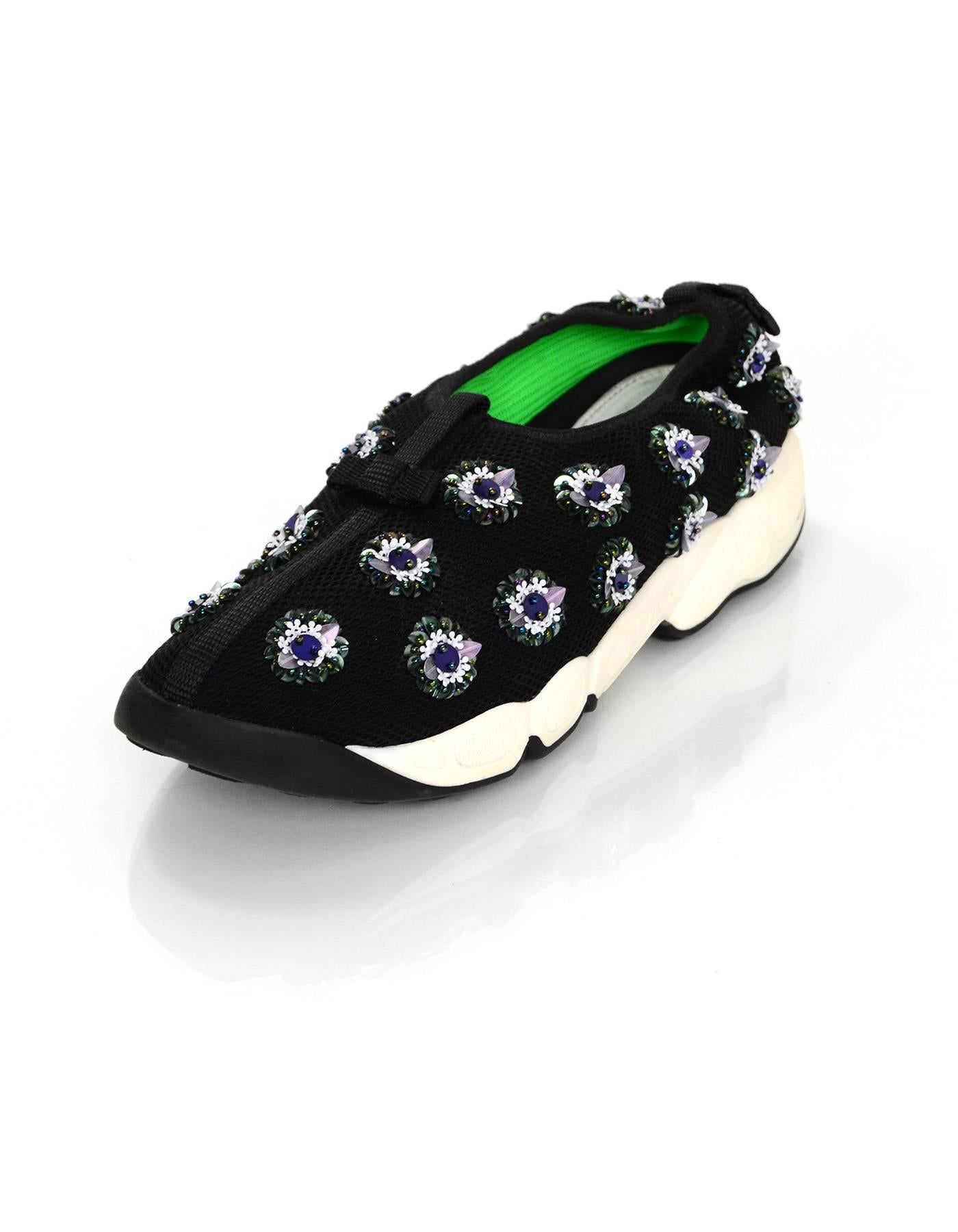 Christian Dior Black and White Floral Beaded Fusion Sneakers Sz 38.5

Features beading throughout

Made In: Italy
Color: Black, white
Materials: Nylon/mesh blend, beads, rubber
Closure/Opening: Slide on
Sole Stamp: Dior Made in Italy 38.5
Overall