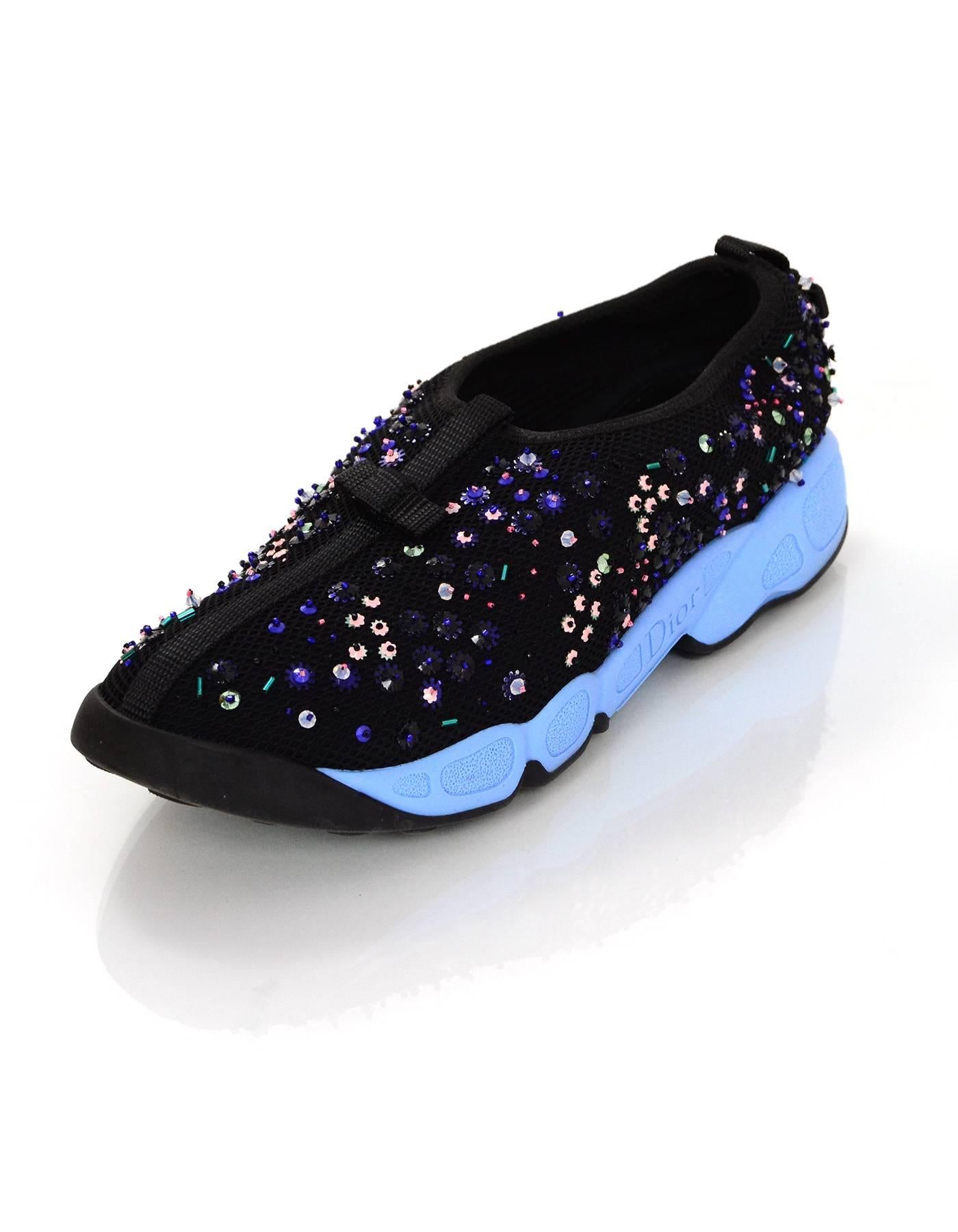 Christian Dior Black and Blue Beaded Fusion Sneakers Sz 38.5
Features beading throughout

Made In: Italy
Color: Black, blue
Materials: Nylon/mesh blend, beads, rubber
Closure/Opening: Slide on
Sole Stamp: Dior Made in Italy 38.5
Overall Condition: