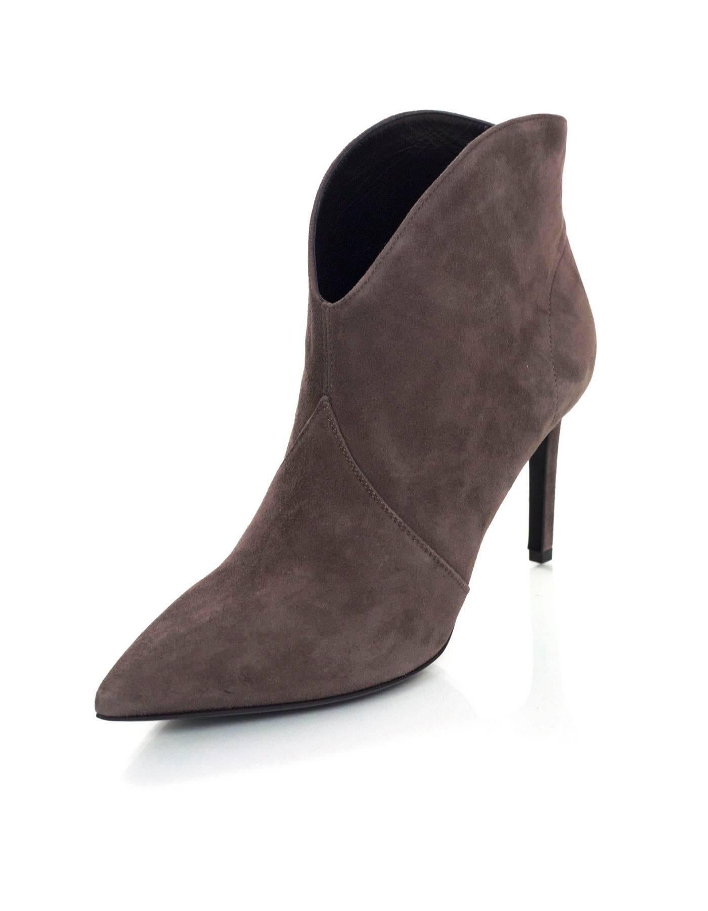 Saint Laurent NEW Grey Suede Paris Ankle Boots 

Made In: Italy
Color: Grey
Materials: Suede
Closure/Opening: Pull on
Sole Stamp: Saint Laurent Paris Made in Italy 38 1/2
Overall Condition: Excellent- like new
Includes: Saint Laurent box and dust