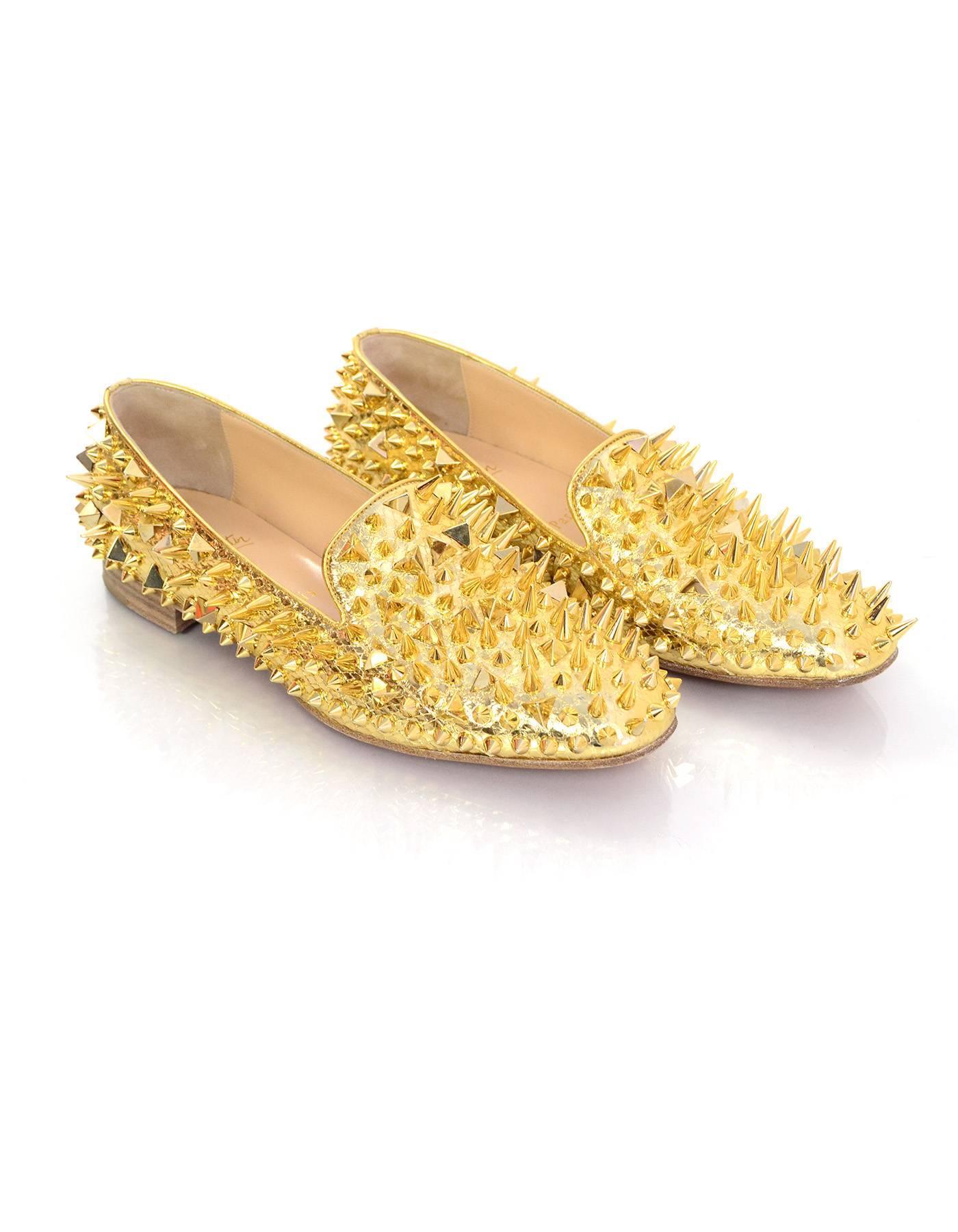 gold loafers with spikes