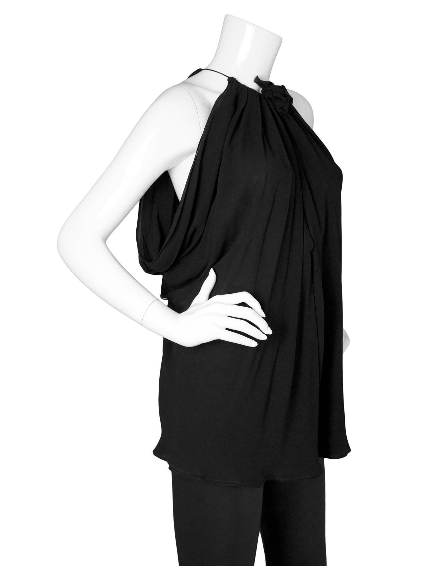 Derek Lam Black Silk Sleeveless Draped Blouse 
Features flower detail at neckline and keyhole opening at bust

Made In: Italy
Color: Black
Composition: 100% silk
Lining: Black, 100% silk
Closure/Opening: Pull over with hook and eye and keyhole