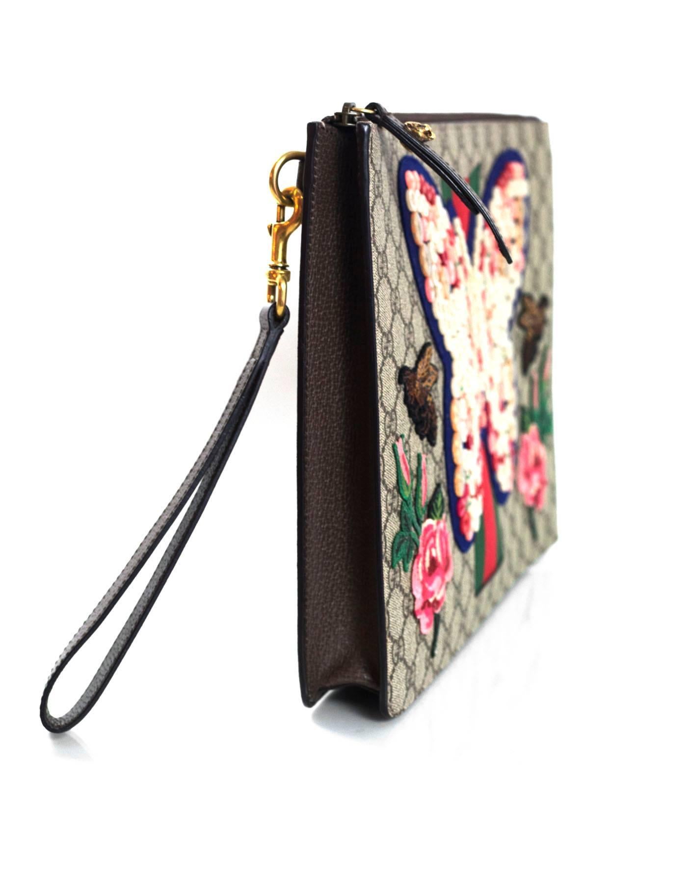 gucci supreme wristlet