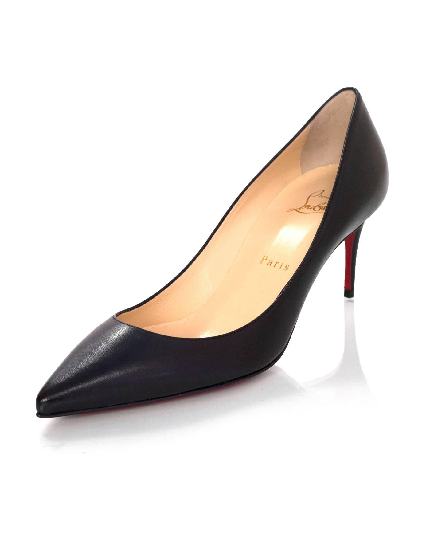 Christian Louboutin NEW Black Decollete Pumps 

Made In: Italy
Color: Black
Materials: Leather
Closure/Opening: None
Sole Stamp: Christian Louboutin Made in Italy 37 1/2
Overall Condition: Excellent
Includes: Christian Louboutin box, dust bag, 1 set