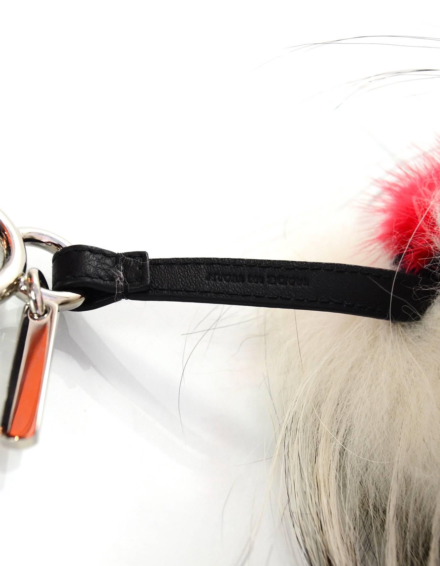 Fendi NEW Black White & Red Fur Archy Bag Bug Charm

Made In: Italy
Year of Production: 2015
Color: White, black and red
Hardware: Silvertone
Materials: Fox, mink, rabbit fur
Closure/Opening: Jump ring push lever
Retail Price: $800 + tax
Overall