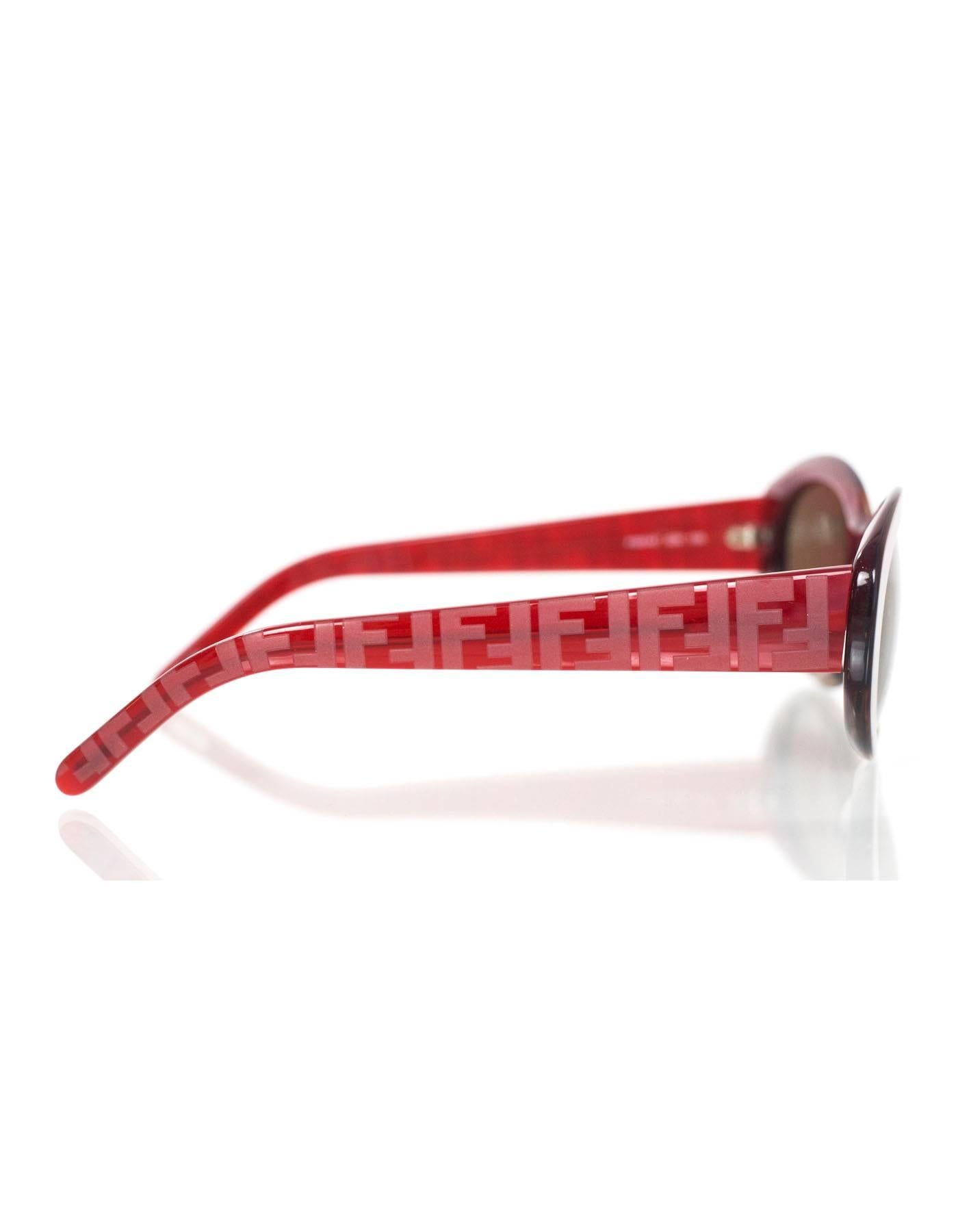 Fendi Burgundy Resin & Zucca Print Cateye Sunglasses

Made In: Italy
Color: Burgundy
Materials: Resin
Arm Stamp: FS5147 620 135
Overall Condition: Excellent pre-owned condition with the exception of one small scratch to edge of left