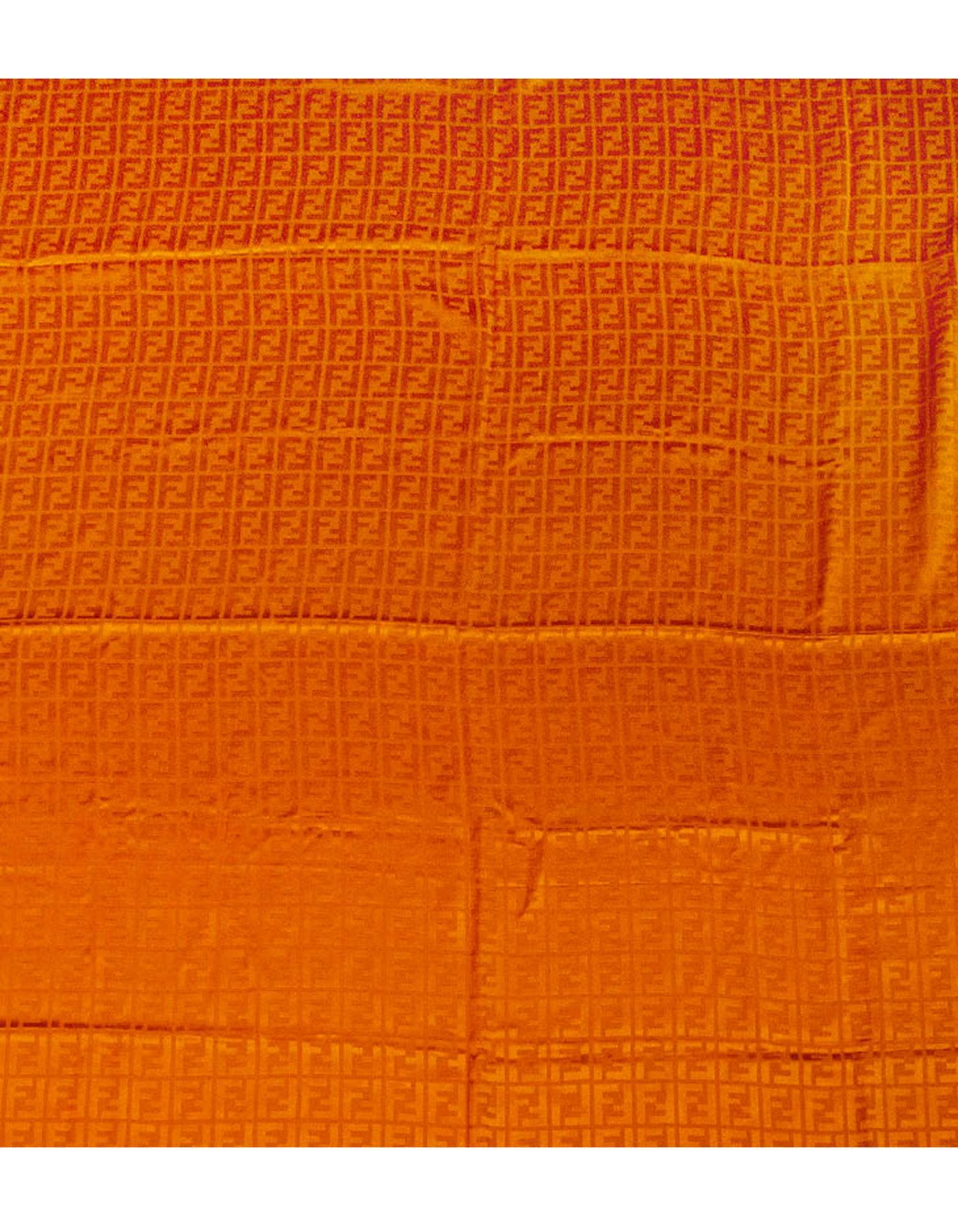Fendi Casa Orange Zucca Throw NWT
Can be worn as a shawl

Made In: Italy
Color: Orange
Composition: 60% Silk, 40% Wool
Retail Price: $995 + tax
Overall Condition: Excellent pre-owned condition, NWT

Measurements:
Length: 33"
Width: 56"