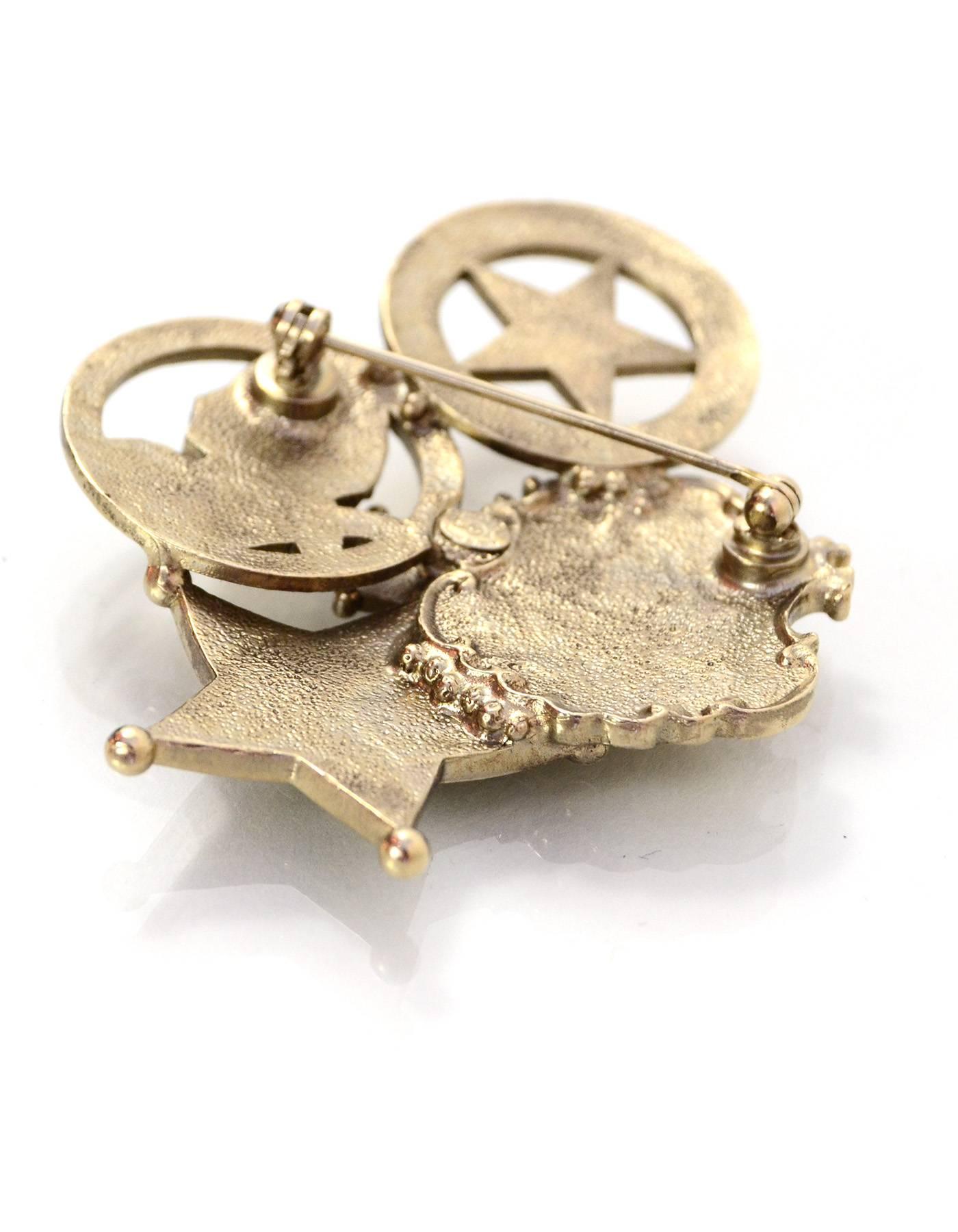 chanel badge brooch