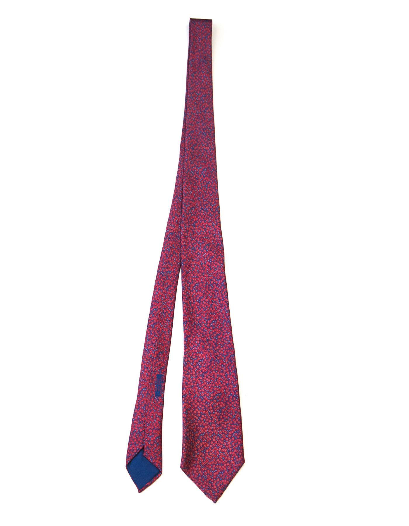 Hermes Red & Blue Dot Print Silk Tie

Made In: France
Color: Red and blue
Composition: 100% silk
Overall Condition: Excellent pre-owned condition
Measurements: 
Length: 57.5"
Width: 2"-3.5"