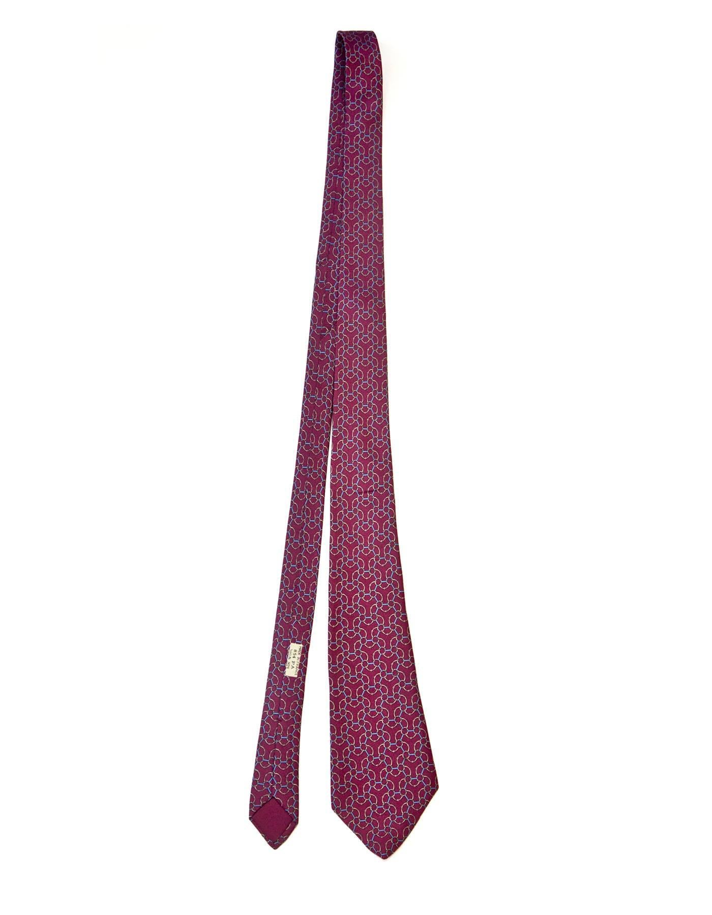 Hermes Burgundy & Blue Chain Print Silk Tie

Made In: France
Color: Burgundy and blue
Composition: 100% silk
Overall Condition: Excellent pre-owned condition

Measurements: 
Length: 58"
Width: 1.5"-3.5"