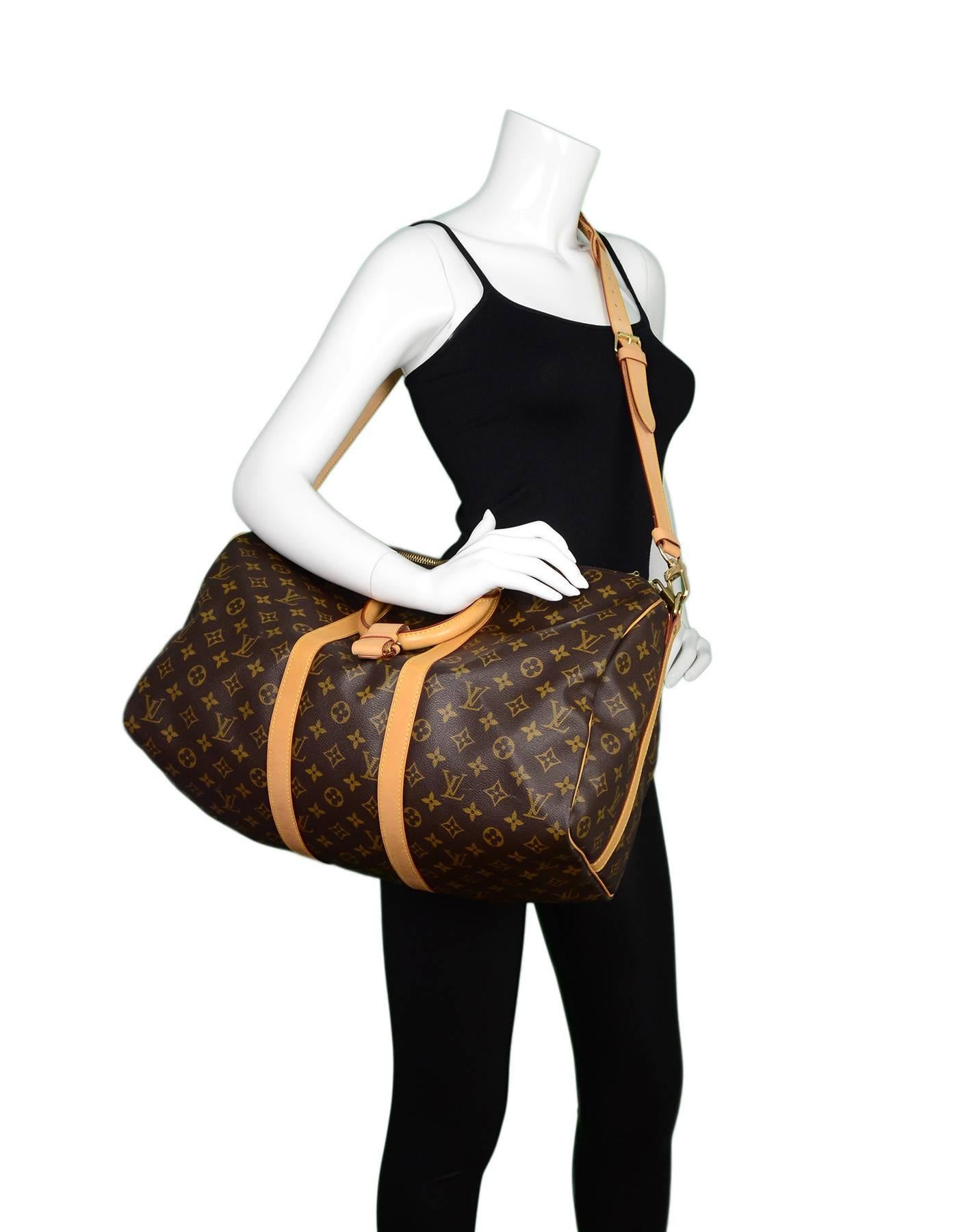 Louis Vuitton Monogram Keepall 45 

Made In: France
Year of Production: 1998
Color: Brown and tan
Hardware: Goldtone
Materials: Coated canvas and leather
Lining: Brown canvas
Closure/Opening: Double zip across top
Exterior pockets: none
Interior