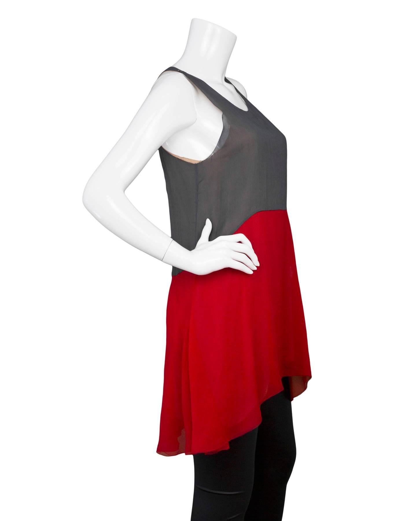 Vera Wang Grey & Red Color Block Sleeveless Top
Features nude silk underlay

Made In: China
Color: Grey and red
Composition: 100% silk
Lining: Nude, 92% silk, 8% lycra
Closure/Opening: Pull over 
Exterior Pockets: None
Interior Pockets: