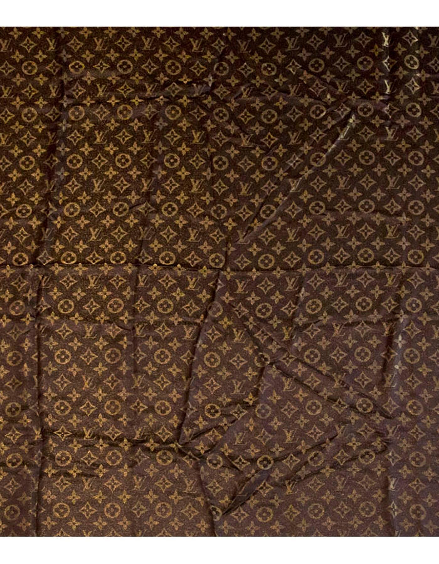 Louis Vuitton Brown Lurex Monogram Shine Shawl

Made In: Italy
Color: Brown and gold
Composition: 47% silk, 26% viscose, 17% wool, 10% polyester
Overall Condition: Excellent pre-owned condition
Retail: $675+ tax
Includes: Louis Vuitton