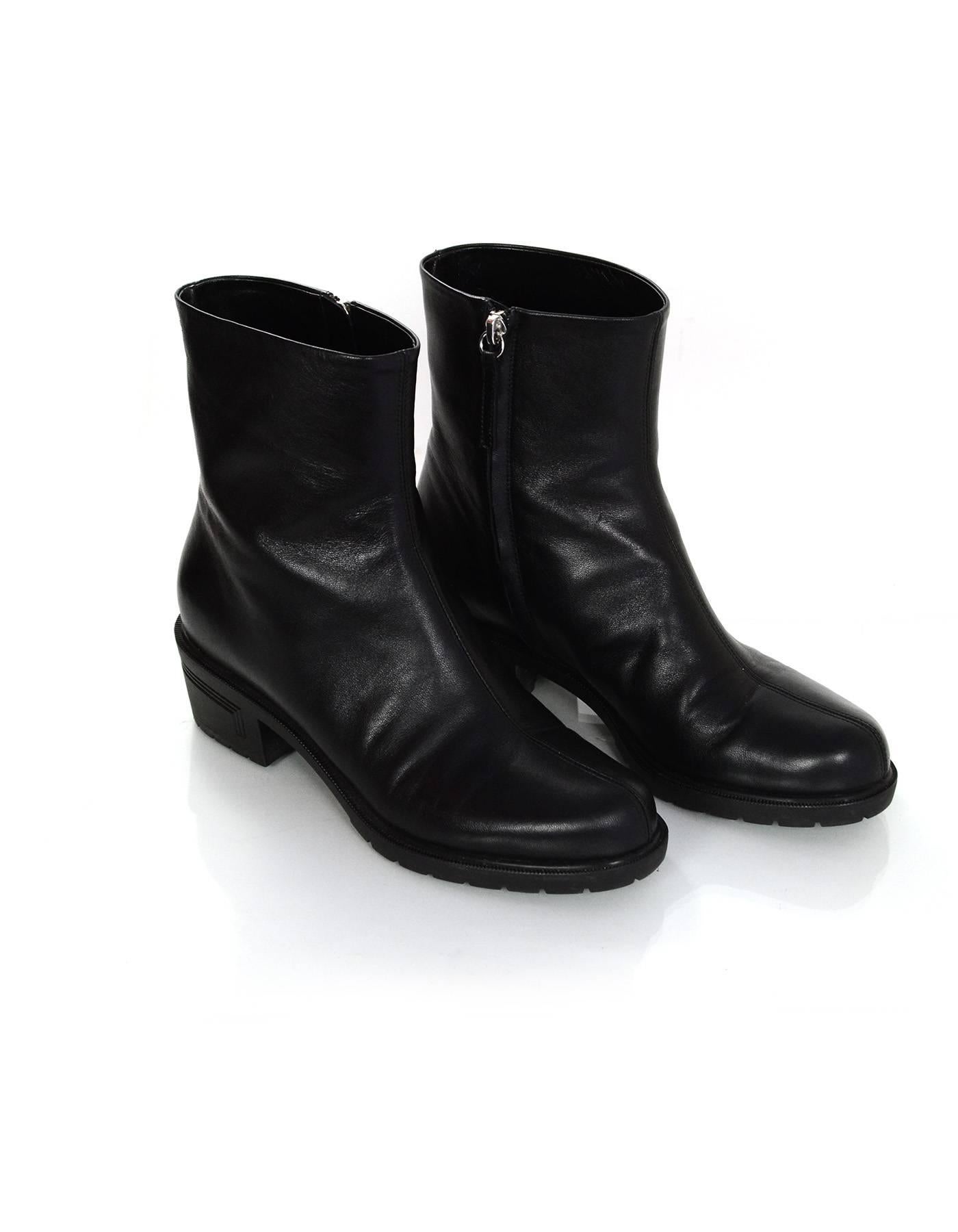 Giuseppe Zanotti Black Leather Ankle Boots Sz 38

Made In: Italy
Color: Black
Materials: Leather
Closure/Opening: Side zip closure
Sole Stamp: Giuseppe Zanotti 38 made in italy
Overall Condition: Excellent pre-owned condition with the exception of