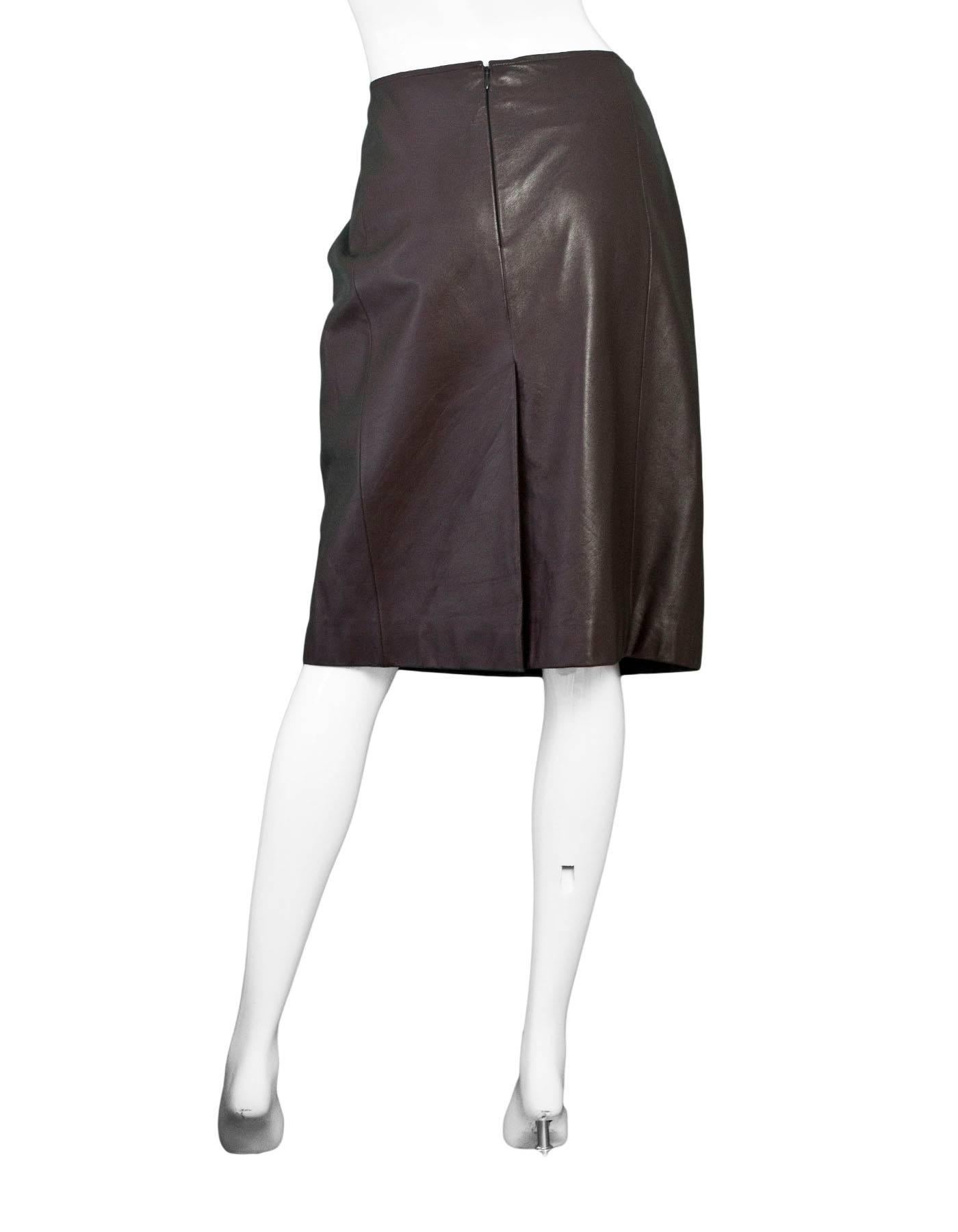 Akris Brown Leather Pencil Skirt 

Made In: Italy
Color: Brown
Composition: 100% leather
Lining: Brown, 100% viscose
Closure/Opening: Back zip up
Exterior Pockets: None
Interior Pockets: None
Overall Condition: Excellent pre-owned condition

Marked