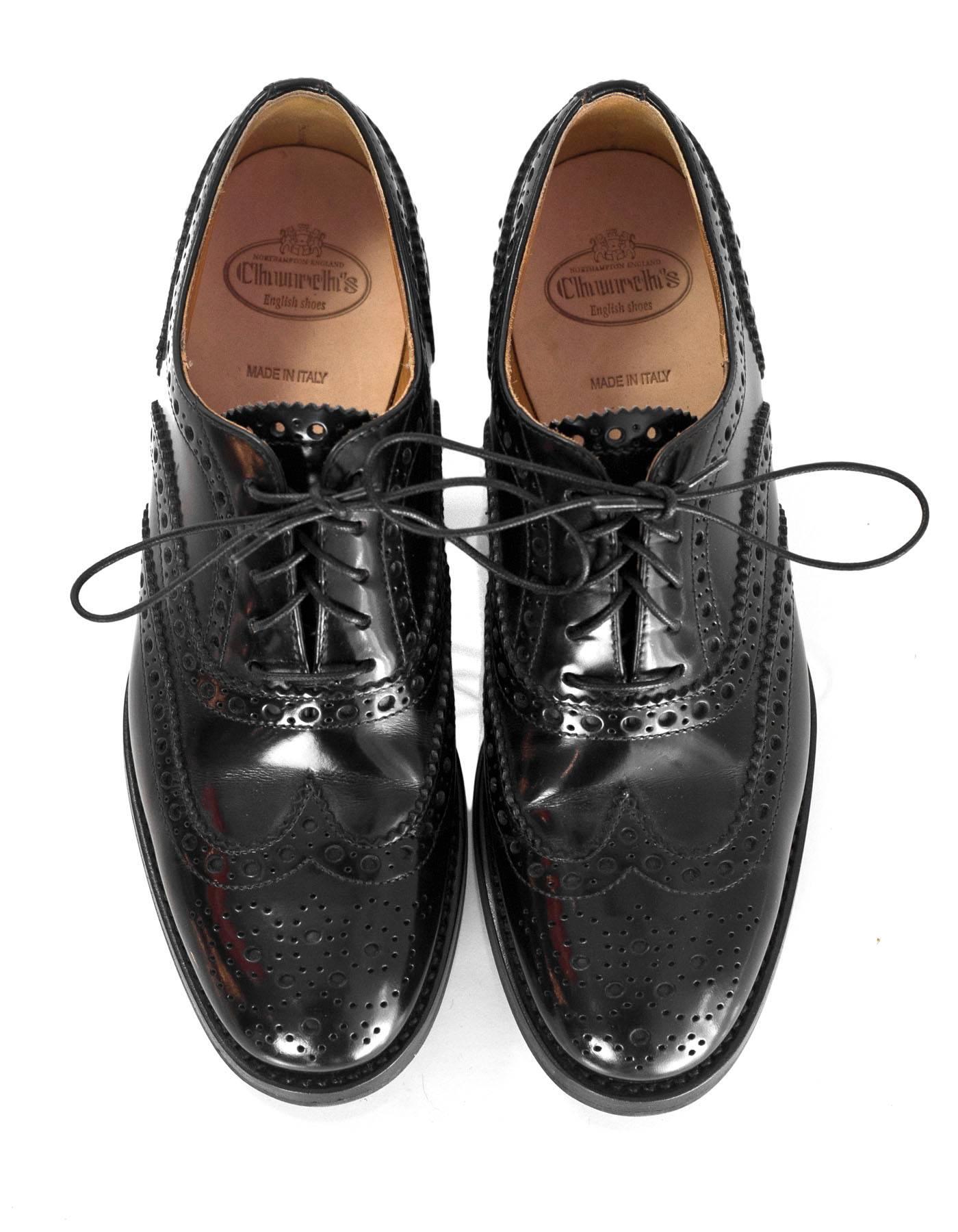 Church's Black Spectator Oxford Shoes

Made In: Italy
Color: Black
Materials: Leather
Closure/Opening: Laces
Sole Stamp: Church's
Overall Condition: Excellent pre-owned condition with the exception of some wear throughout soles
Marked Size: US7
Heel