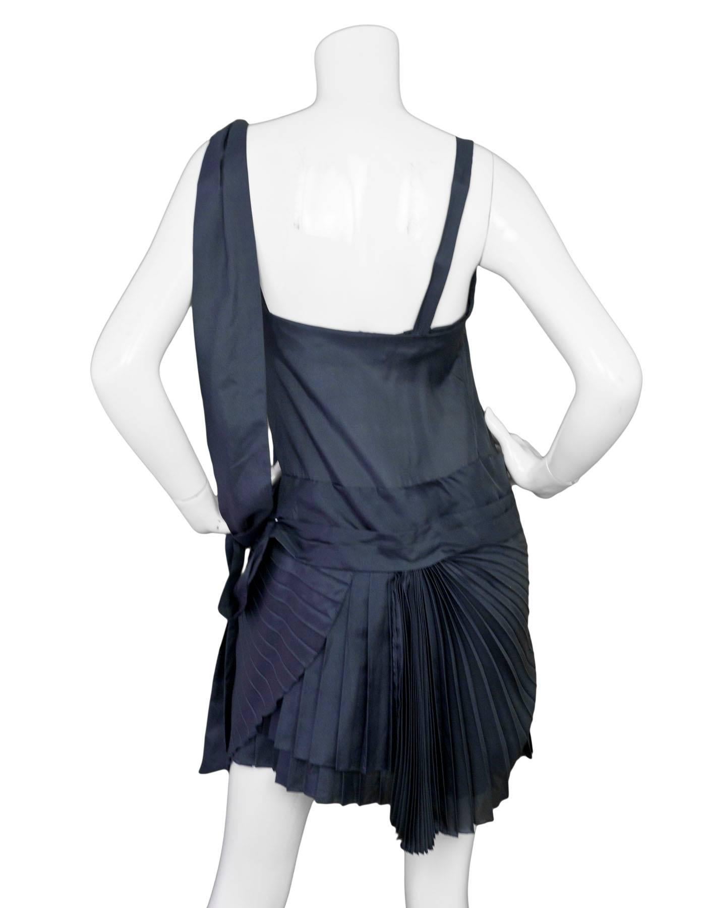 Alexander McQueen Vintage Slate Silk Pleated Ruffle Dress
Features fanned micropleating throughout skirt

Made In: Italy
Color: Blue-Grey Slate
Composition: 100% Silk
Lining: Slate, 100% Silk
Closure/Opening: Side zipper closure
Exterior Pockets: