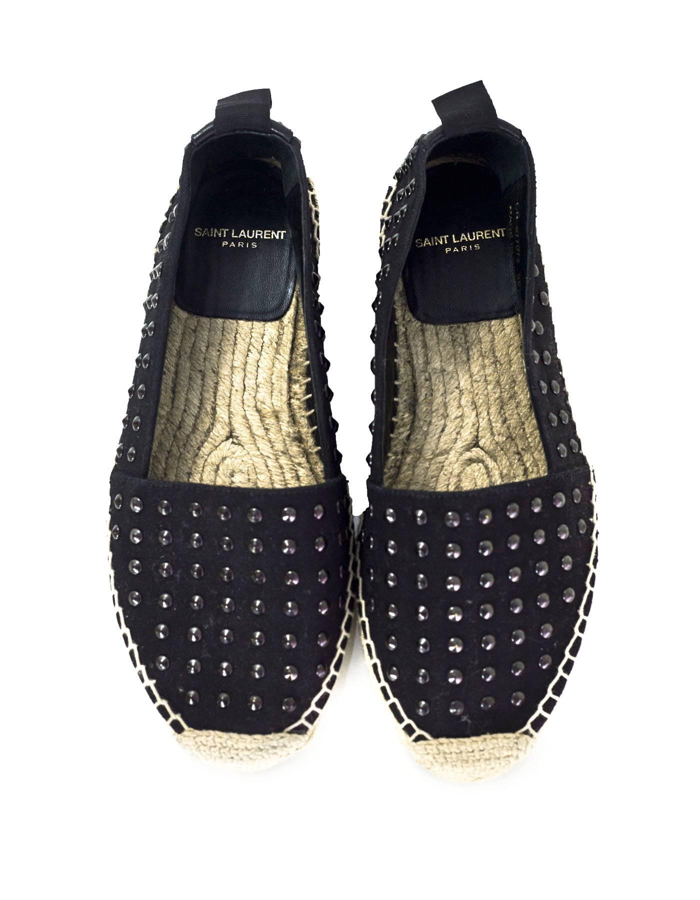Saint Laurent Black Canvas Studded Espadrilles

Made In: Spain
Color: Black
Materials: Canvas and metal
Closure/Opening: Slide on
Sole Stamp: Saint Laurent Paris
Overall Condition: Excellent pre-owned condition with the exception of wear/soiling