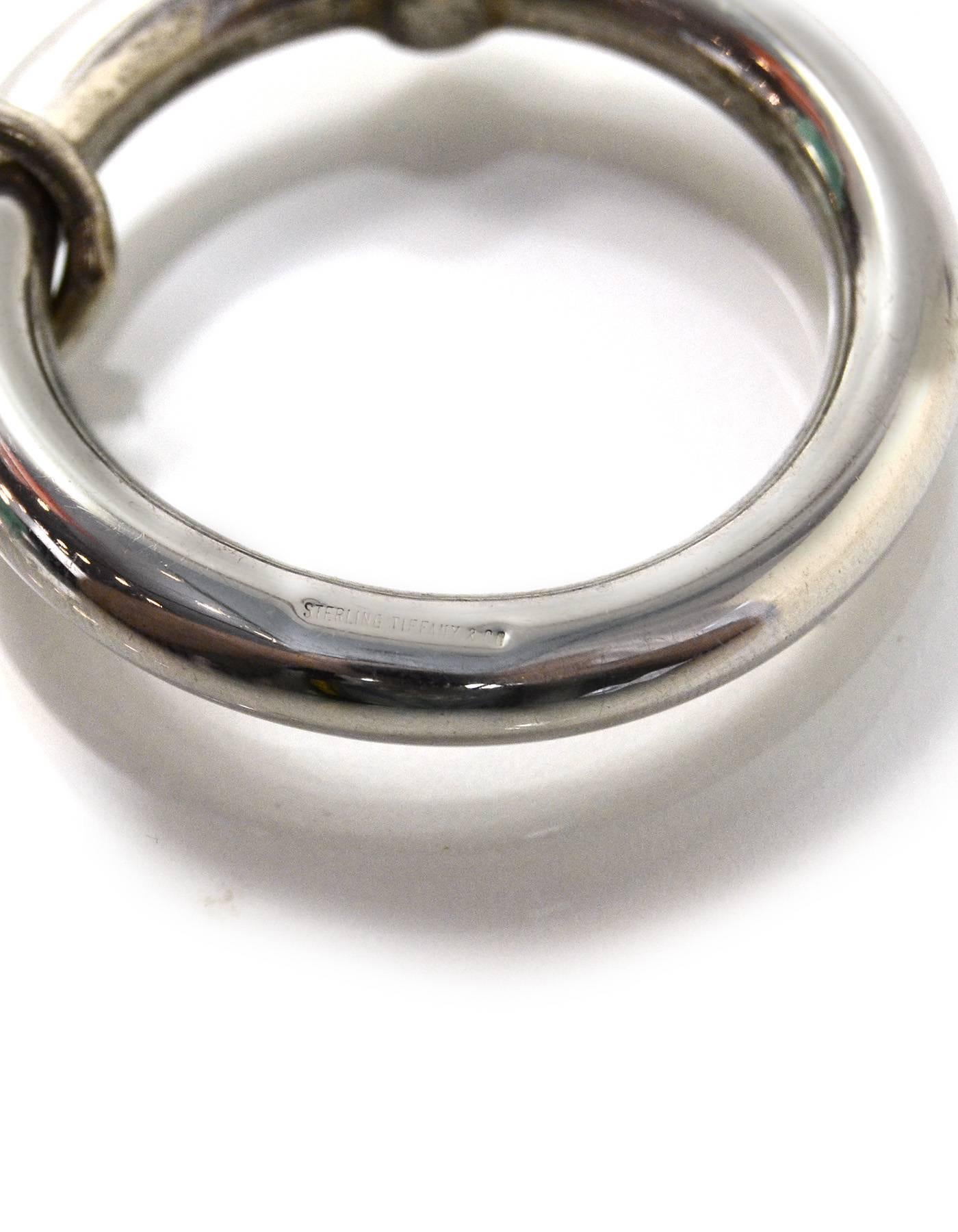 Tiffany & Co. Sterling Silver Rattle

Color: Silver
Materials: Sterling silver
Stamp: Sterling Tiffany & Co
Overall Condition: Excellent pre-owned condition with the exception of tarnishing and surface marks throughout
Included: Tiffany