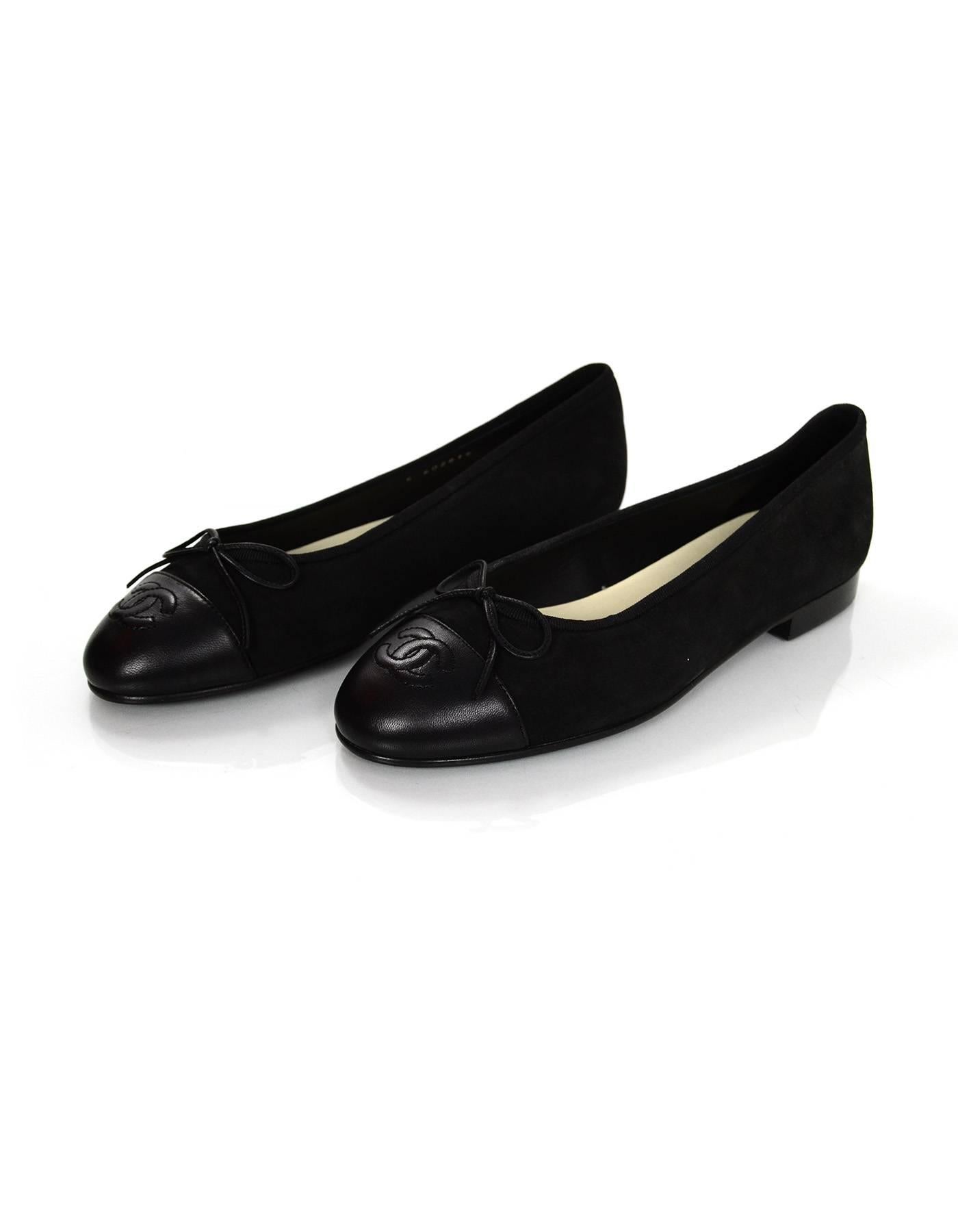 Chanel Black Suede Ballet Flats Sz 36.5 NIB

Made In: Italy
Color: Black
Materials: Suede. leather
Closure/Opening: Slide on
Sole Stamp: CC Made in Italy 36.5
Retail Price: $750 + tax
Overall Condition: Excellent pre-owned condition - NIB
Included: