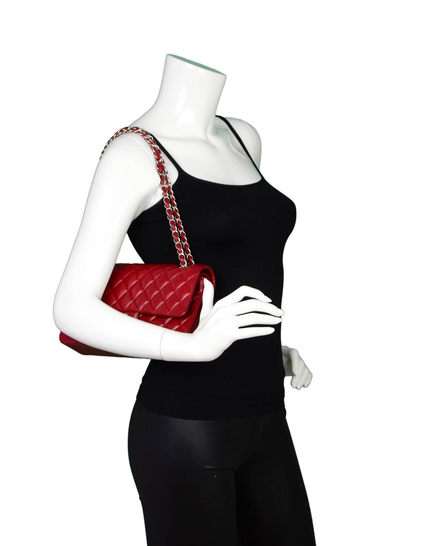 Chanel Red Quilted Caviar Classic Medium Double Flap Bag

Made In: France
Year of Production: 2012
Color: Red
Hardware: Silvertone
Materials: Caviar leather
Lining: Red leather
Closure/opening: Double flap top with snap and CC twist lock
Exterior